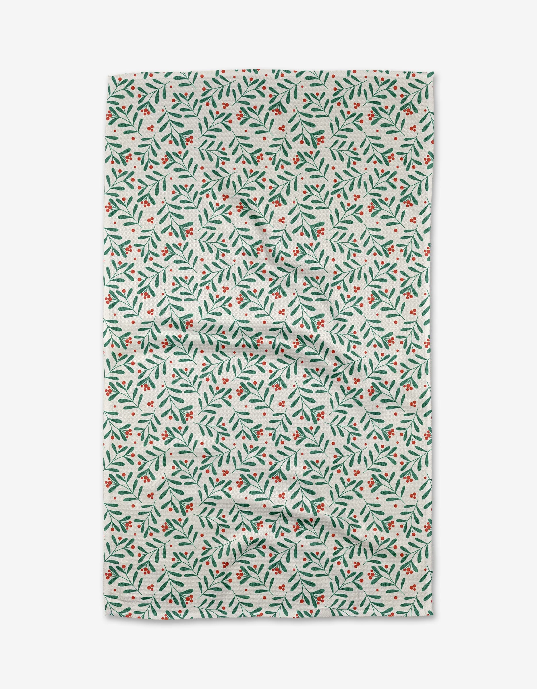 The Merry Berry Cherry Red tea towel by Charlie Rowan Designs features a festive botanical pattern of green leaves and red berries on white. Made from recycled materials, its quick-drying fabric is perfect for your kitchen.