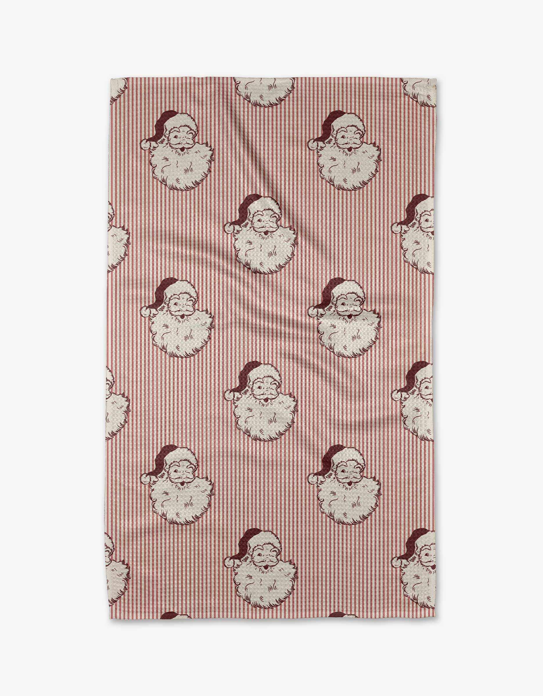 The Mr.Clause kitchen towel by Kelsi Fullmer features red and white stripes with evenly arranged Santa faces in red hats, all crafted from recycled materials for an eco-friendly holiday accent.