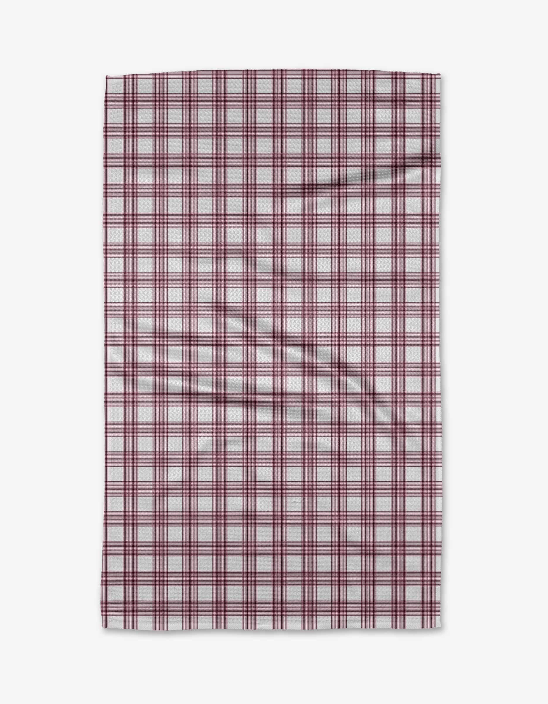 The Buy Guide Multi Gingham - Wine tea towel features a red and white checkered pattern, shown flat with visible creases. Crafted from durable Geoweave fabric for excellent absorbency and long-lasting use.