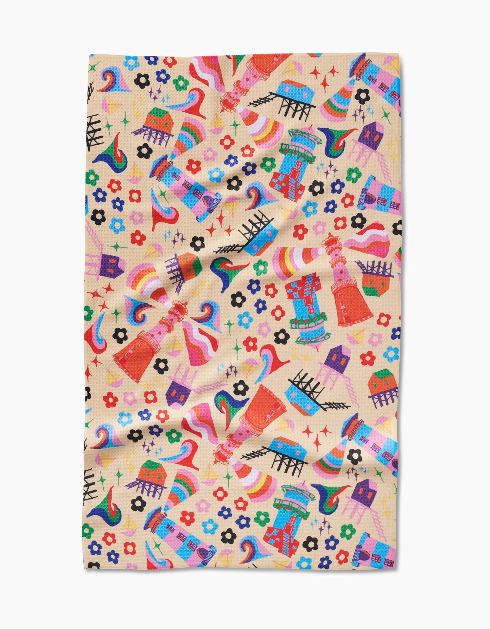 My Place by Ania Zwara Art is a Geoweave fabric tea towel with a playful pattern of rainbows, birds, houses, flowers, hearts, and stylized animals on a beige background.