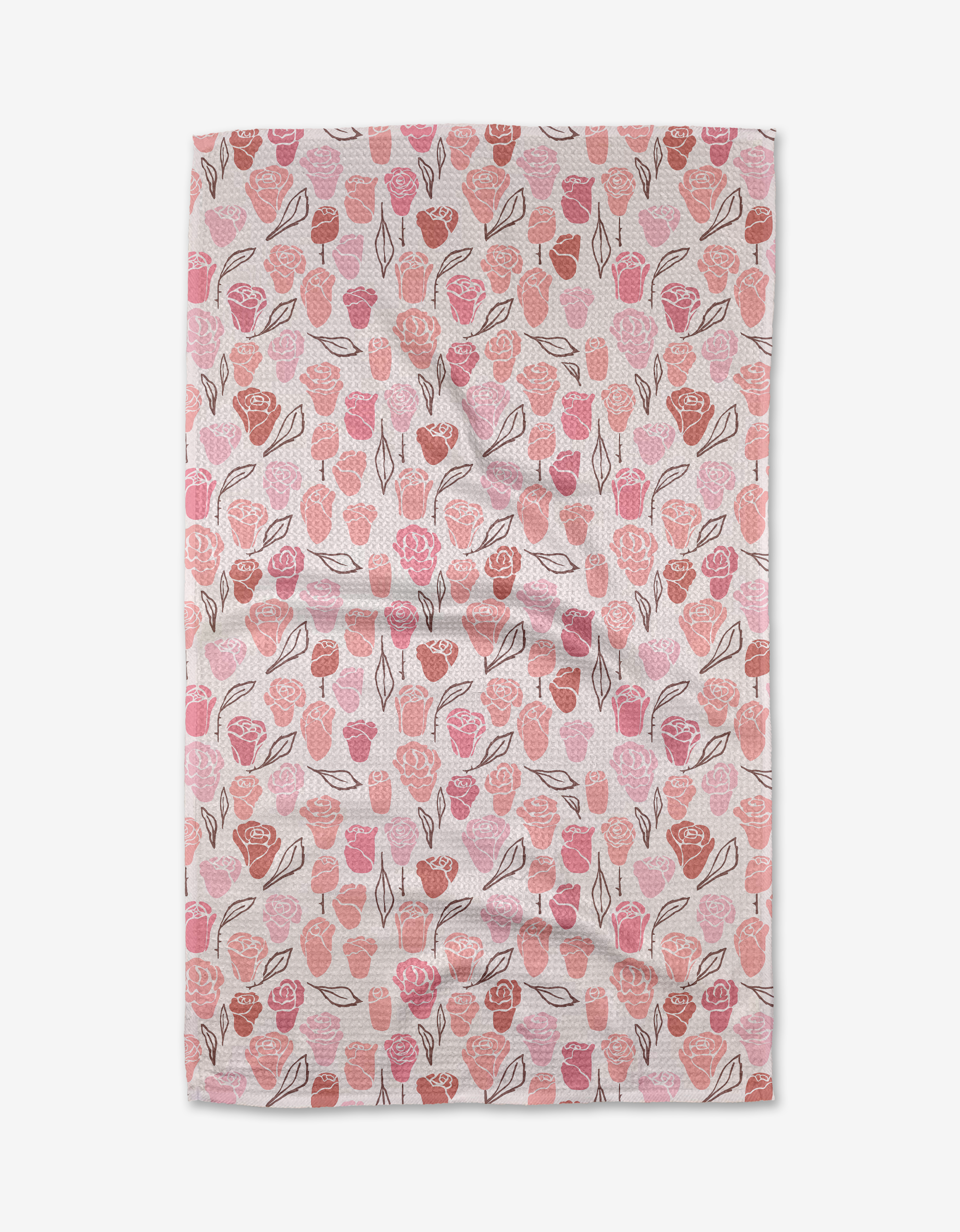 The Neutral Rose tea towel by Elisabeth Wing features a textured design with pink and red tulip flowers and green leaves scattered evenly on a white background.