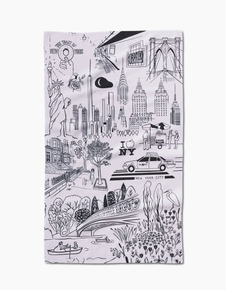 The New York towel by Elisabeth Wing features black-and-white illustrations of iconic NYC landmarks and is made from ultra-absorbent Geoweave fabric for quick drying and comfort.