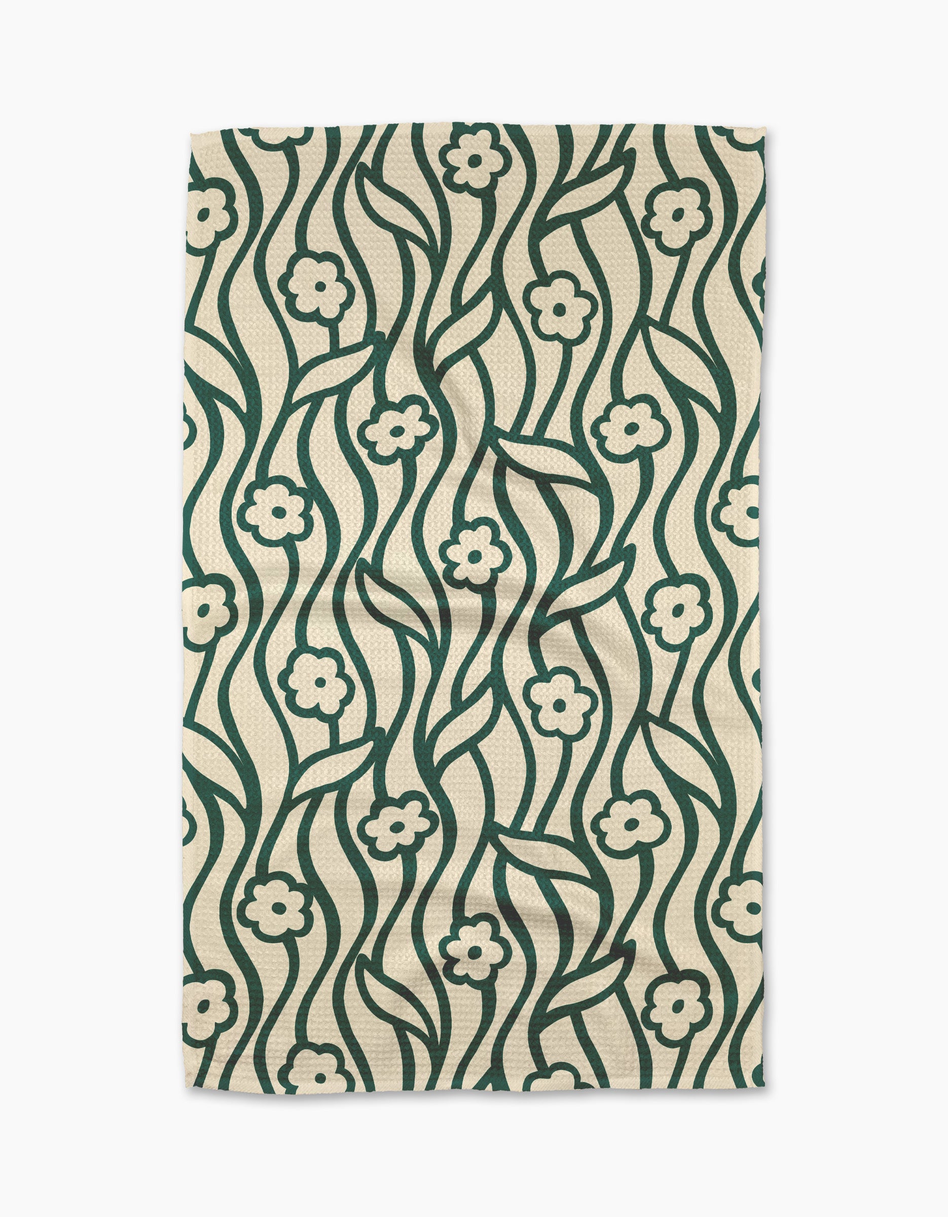 The Gerdadzy Nostalgic Flowers tea towel is rectangular and beige, featuring a green floral pattern with wavy stems and stylized flowers.
