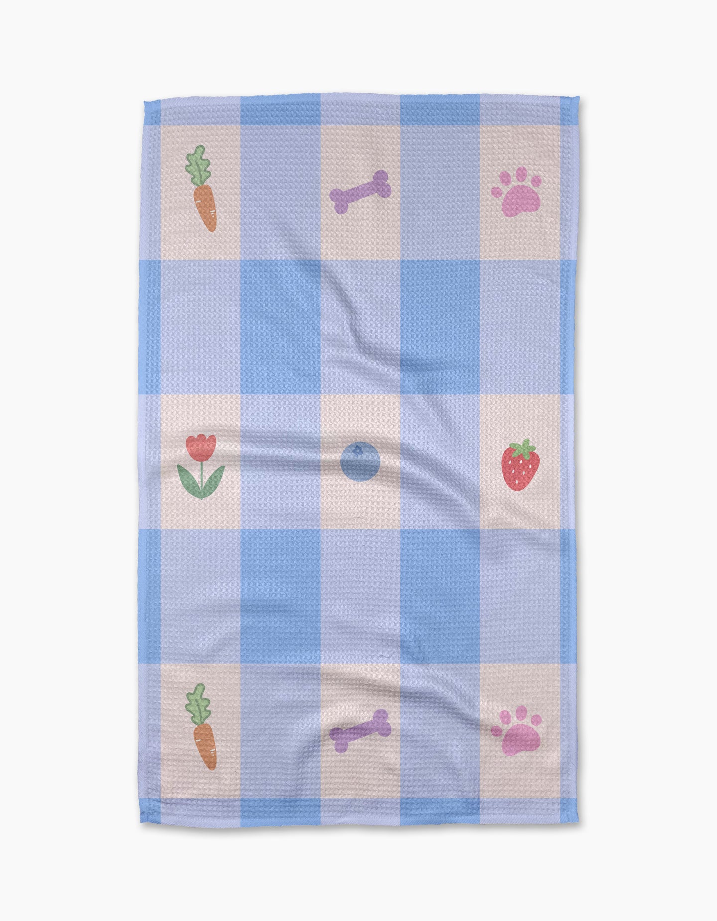 The Pawfect Picnic towel by Letters By Shells is a blue and white checkered, ultra-absorbent towel with carrot, strawberry, bone, paw print, and tulip patterns in some squares.