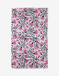 The Petal Symphony Tea Towel by Anette Heiberg features pink floral shapes, black branches, and blue leaves on white Geoweave™ fabric for superior absorbency.