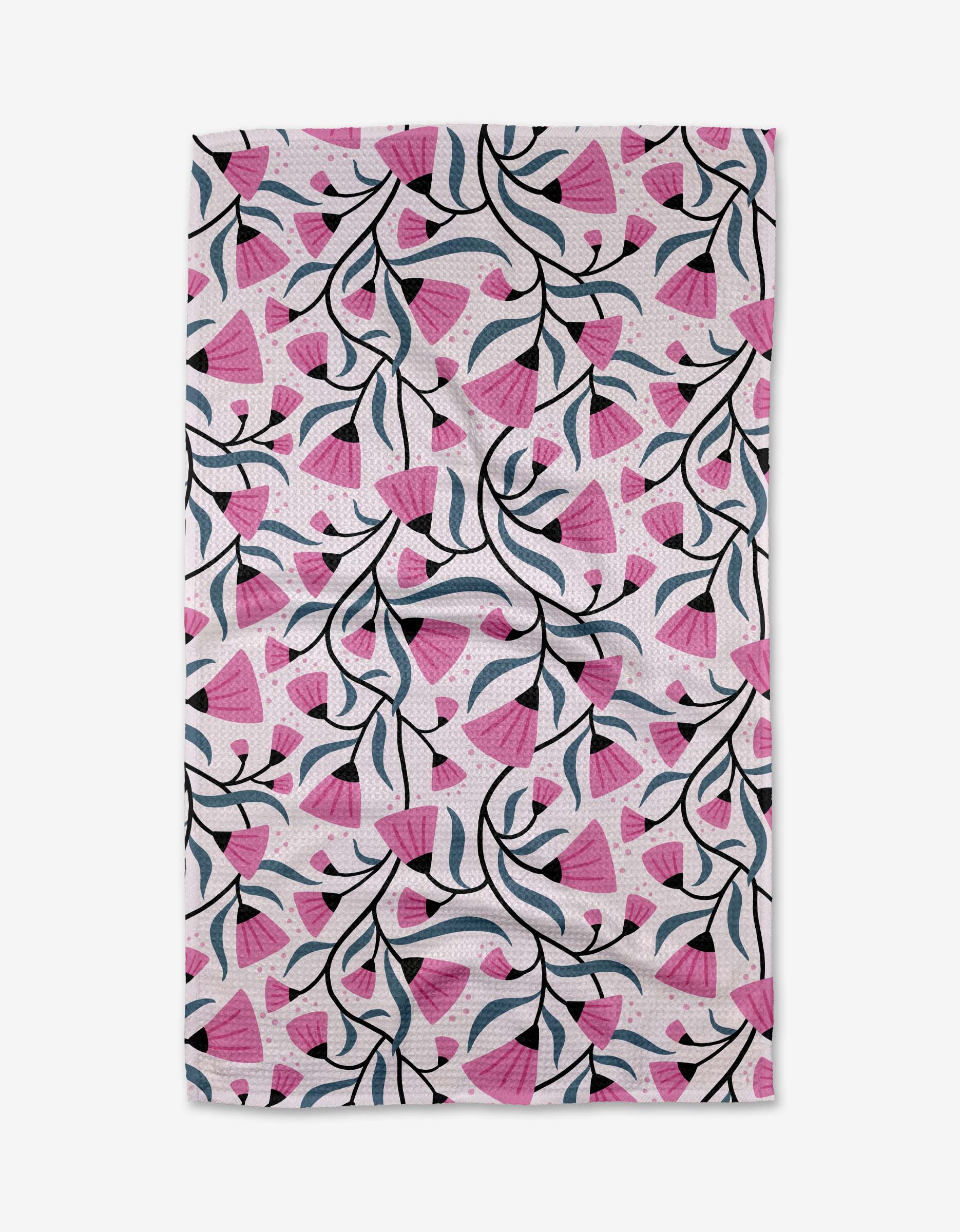 The Petal Symphony Tea Towel by Anette Heiberg features pink floral shapes, black branches, and blue leaves on white Geoweave™ fabric for superior absorbency.