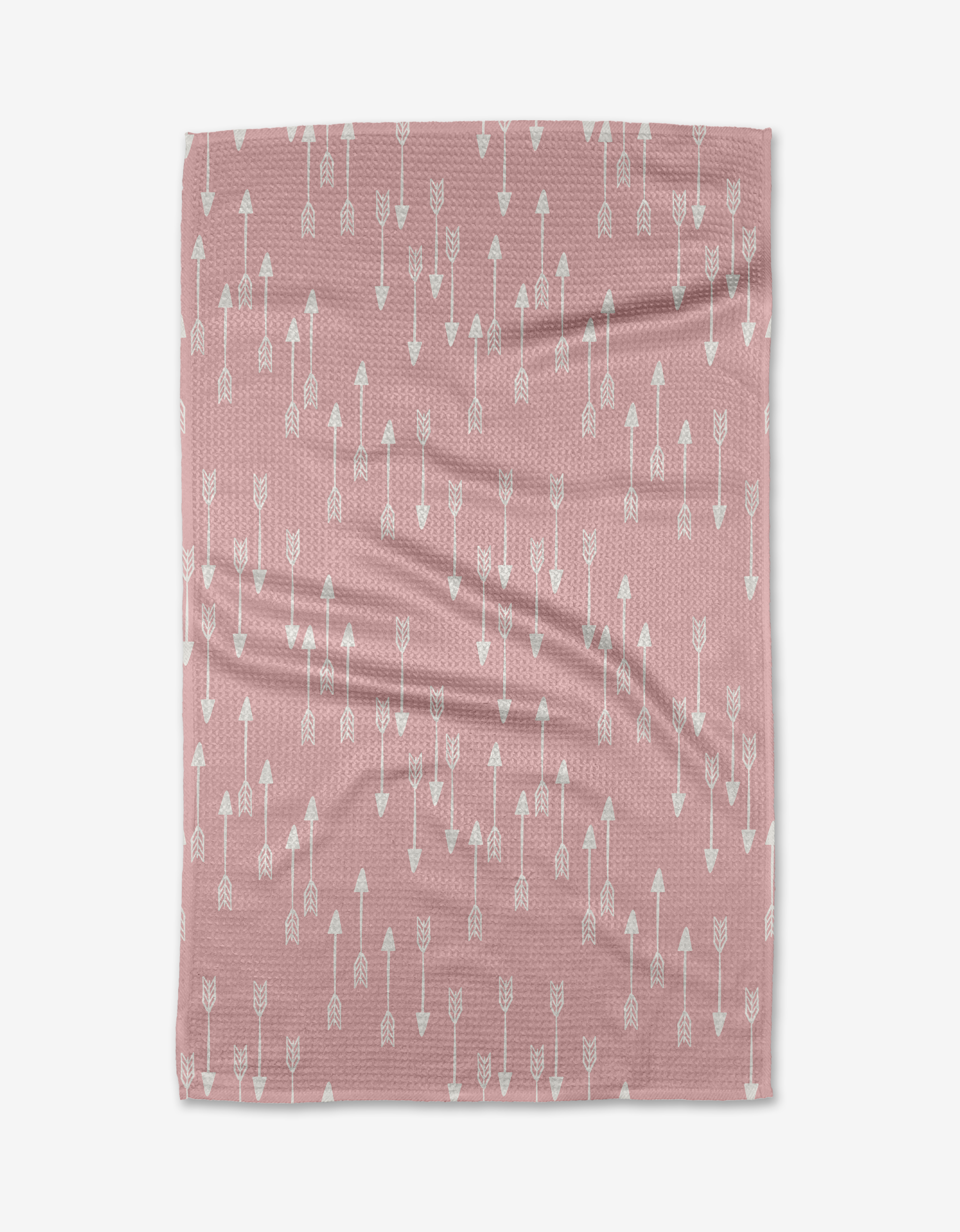 The Pink Little Arrows blanket by Hufton Studio is a soft pink throw made from recycled materials, featuring a white arrow pattern on a white background.