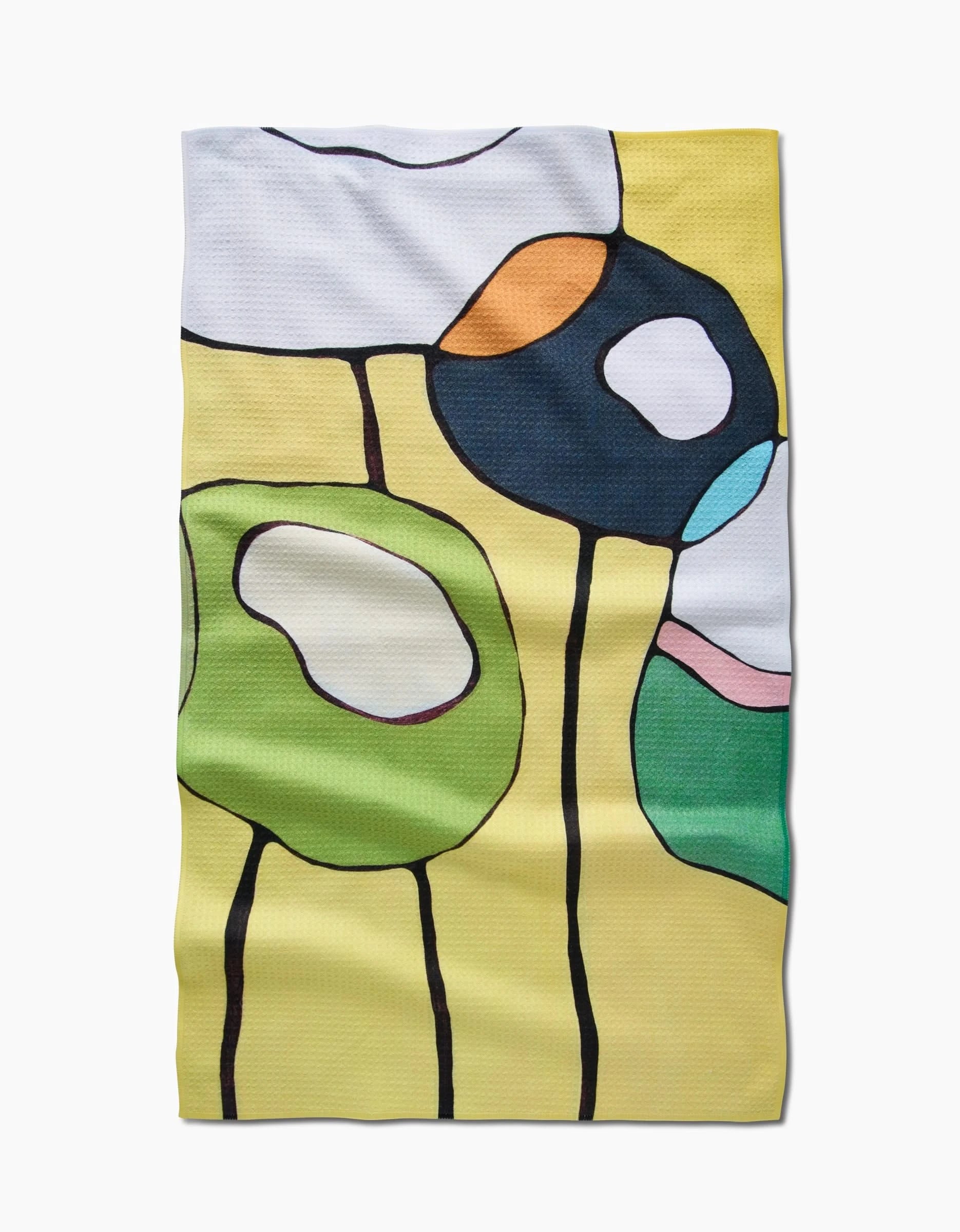 The Poppies on Yellow Tea Towel by Rachel Austin features an abstract circle pattern in green, white, navy, orange, and teal on a yellow background, crafted with Geoweave™ fabric for superior absorbency.