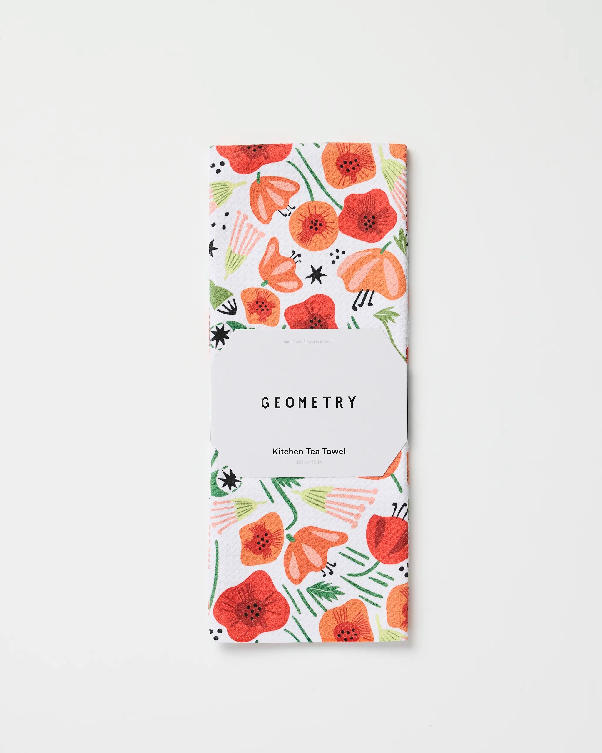 A folded, absorbent dish towel with a red, orange, and green floral pattern is shown. A white label around the towel reads Elisabeth Wing Poppy Power. The background is plain white.