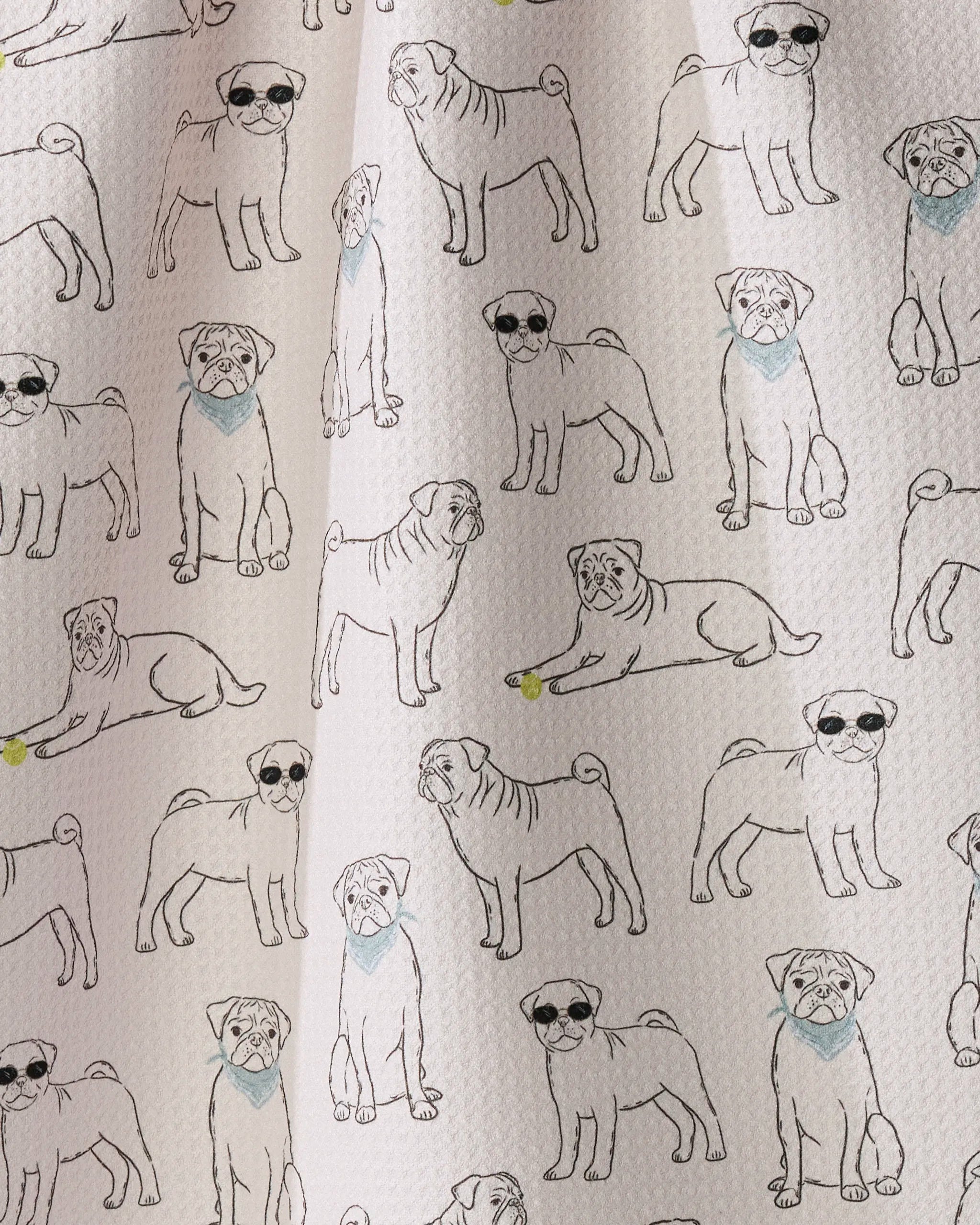Pug Pals by Geometry features repeated line drawings of pugs—some sporting sunglasses, others wearing blue bandanas, and one with a yellow ball—set against a textured white background. This quirky pattern brings playful charm to any ultra-absorbent towel or recycled kitchen towel.