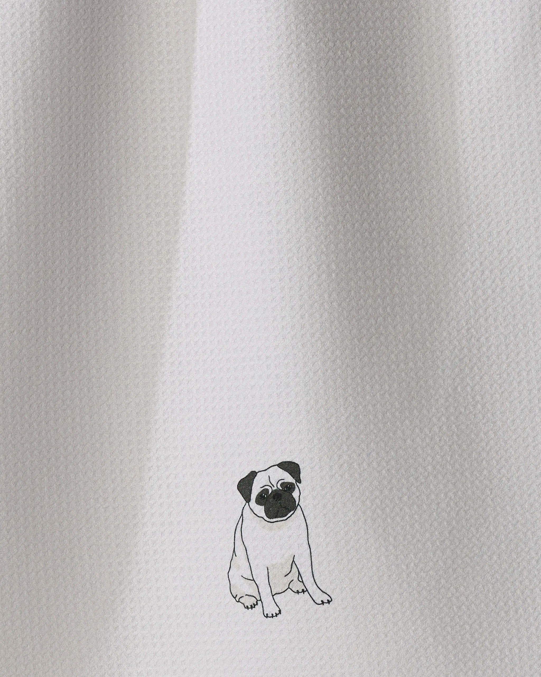 A small, minimalist black and white illustration of a pug dog—titled “Pug Pose” by Geometry—rests on a textured white background, making it an ideal design to bring charm to an ultra-absorbent tea towel crafted from recycled materials.