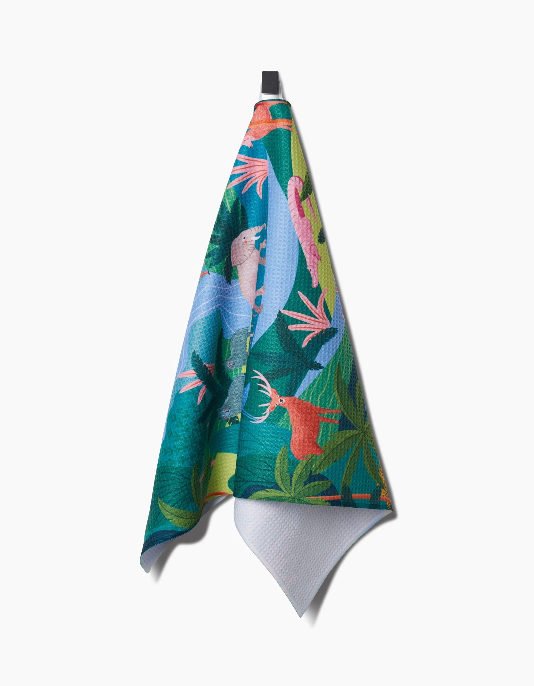 The “Rain Forest” Tea Towel by Ceyda Alasar features illustrated sloths, birds, and tropical leaves on Geoweave™ fabric, with a black hanging loop set against a white background.
