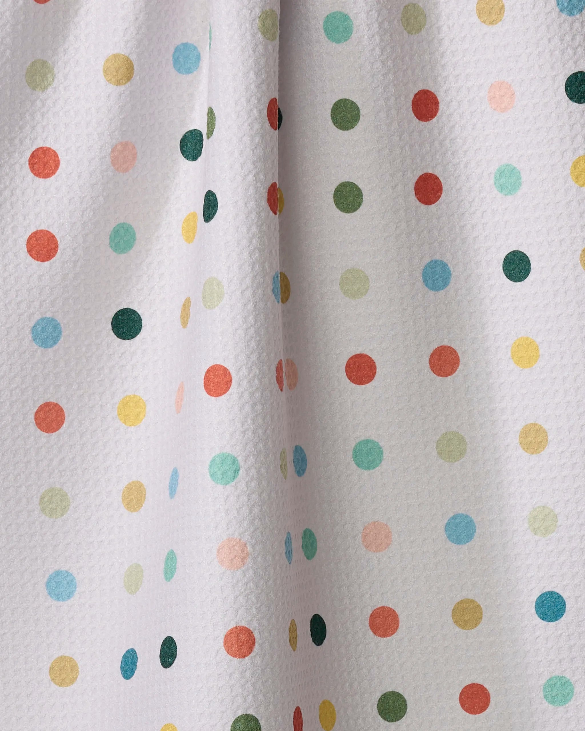 The Elizabeth Edwards Retro Dot towel features ultra-absorbent white fabric with a textured surface and colorful, evenly spaced polka dots, adding a cheerful touch to any kitchen.