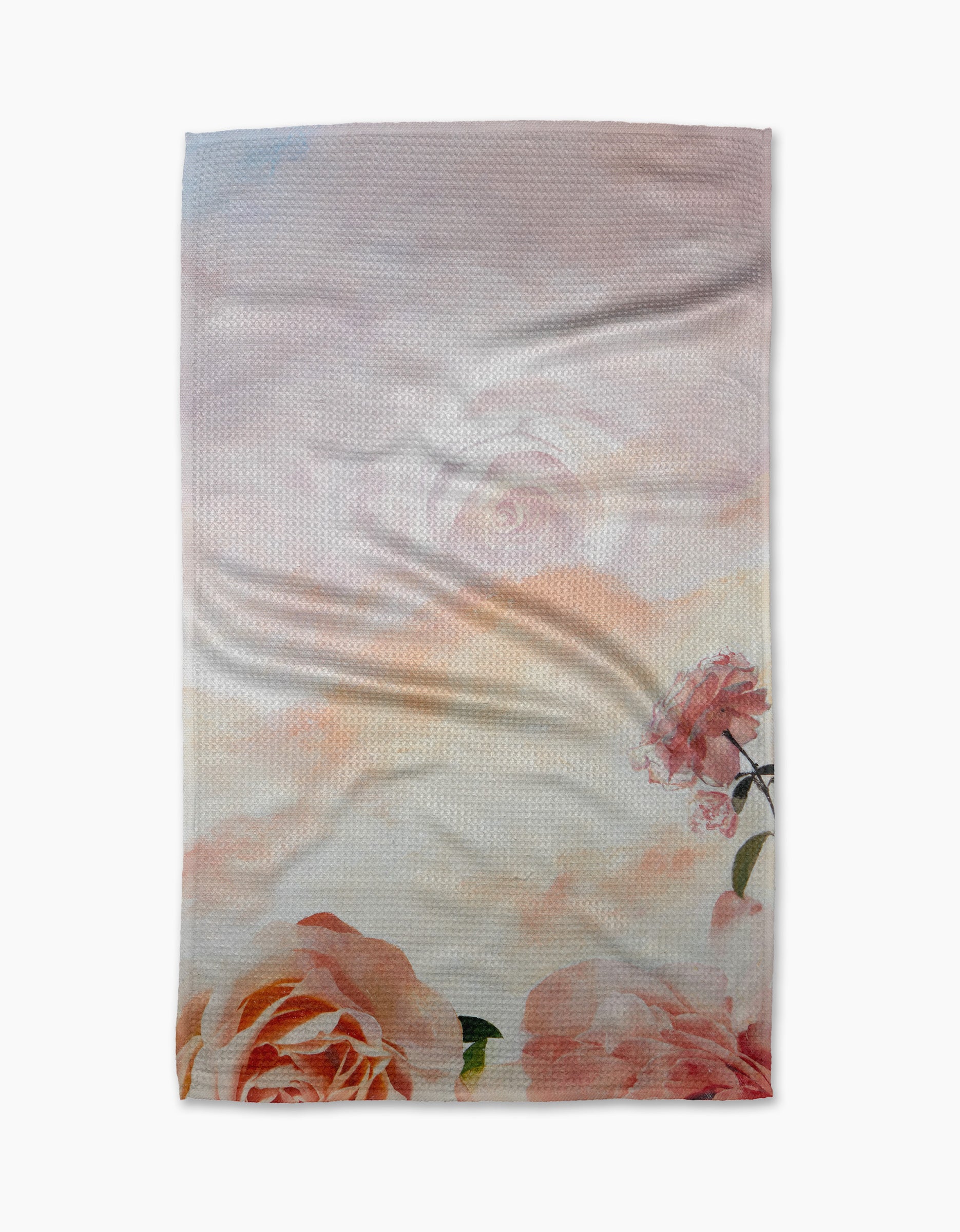 The "Rhapsody in Bloom" tea towel by Stefanie Bales features a pastel sky, soft clouds, and bold pink and coral roses—crafted from recycled materials for an eco-friendly, romantic touch.