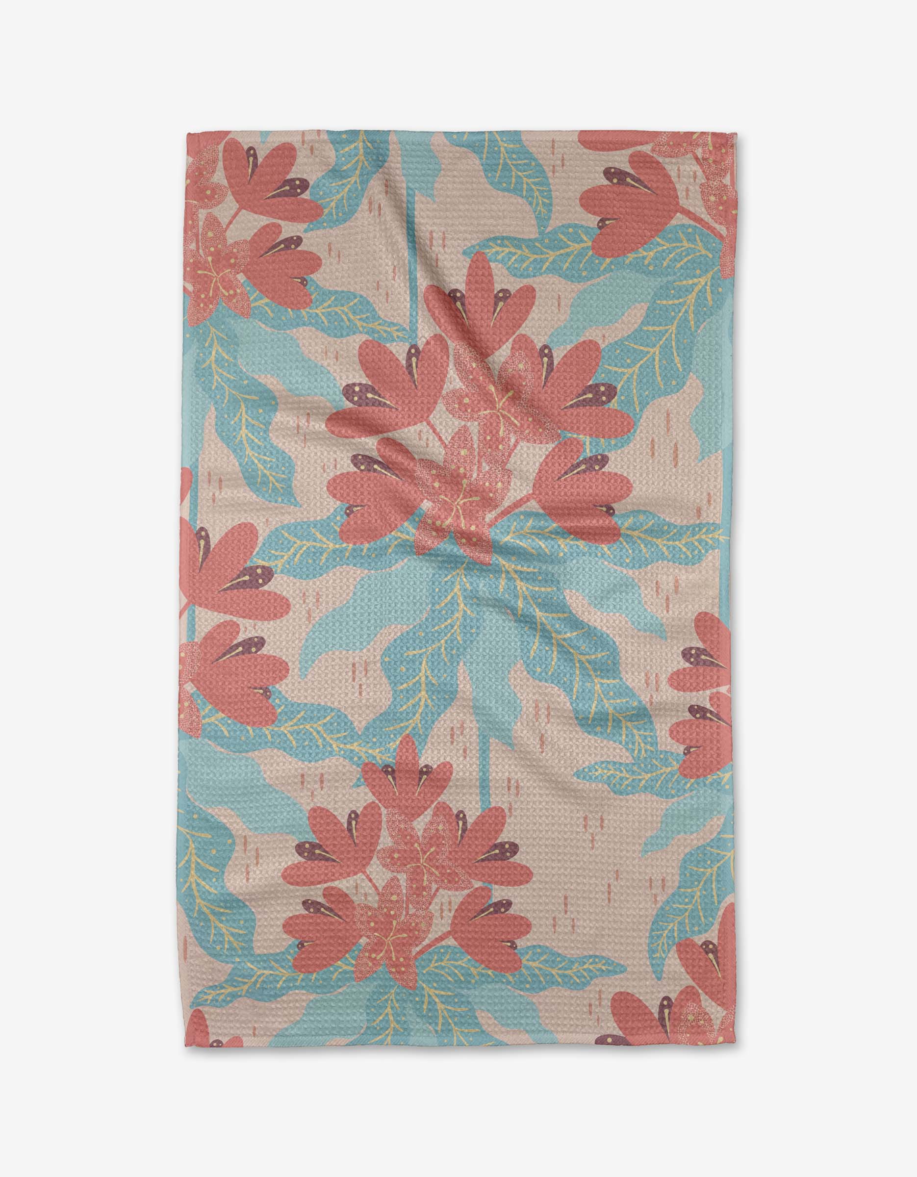 The Rhododendron tea towel by Julianne Haness features large red flowers and blue-green leaves on a tan background, crafted from ultra-absorbent Geoweave™ fabric, and lies slightly wrinkled on a white surface.