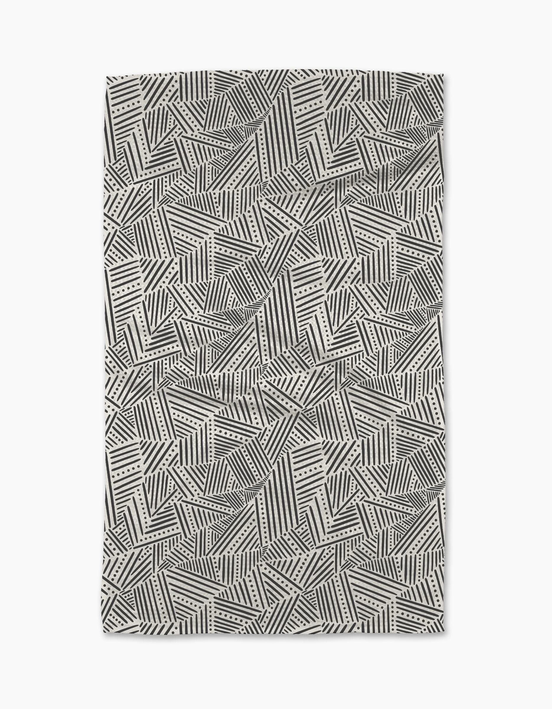 The Rhythm Current Stripes area rug by Sarah Daugherty features a black and white geometric pattern of overlapping lines, dots, and zigzags—an abstract, modern design perfect for enhancing your stylish kitchen space.