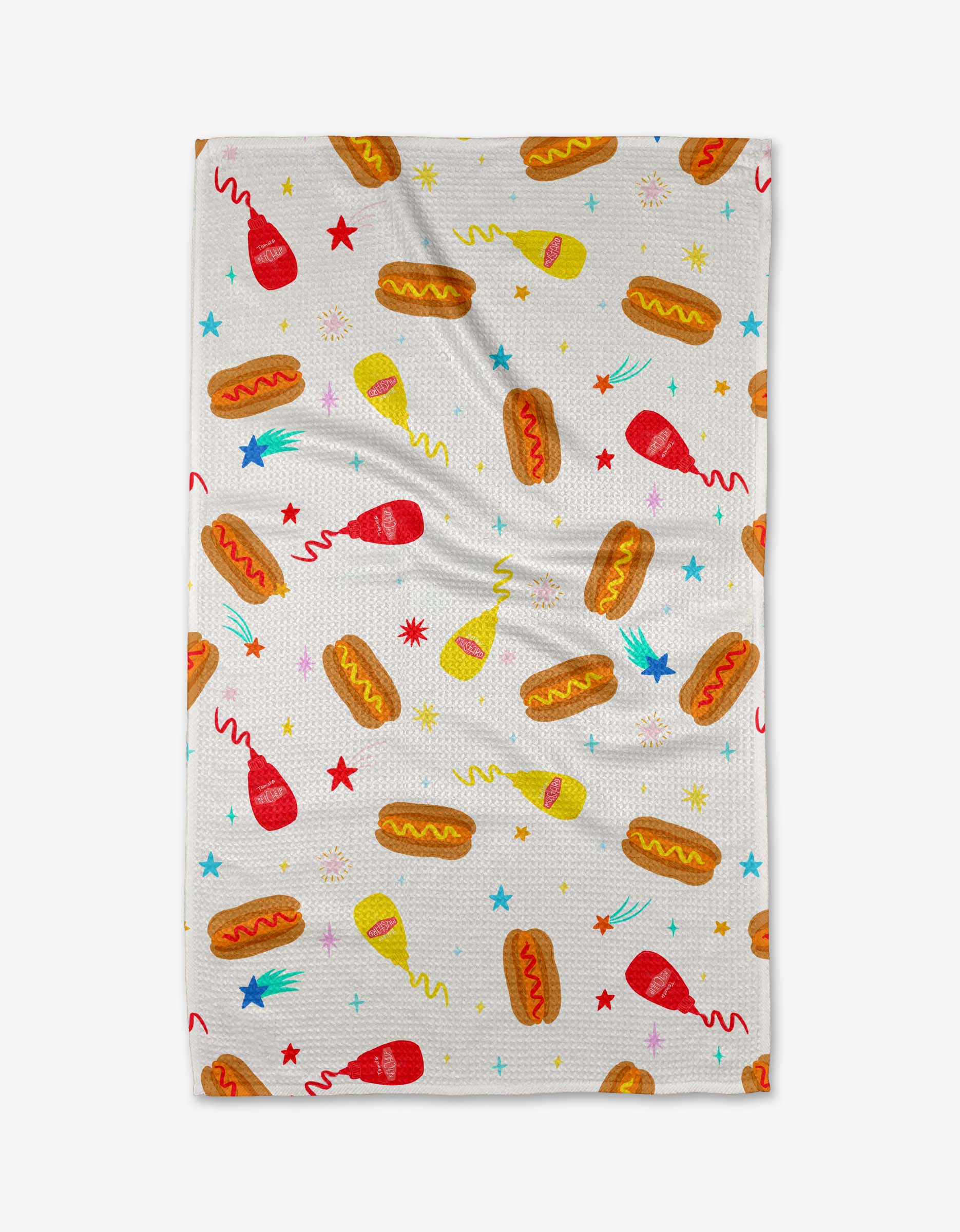 The Rocket Relish tea towel by Vaishali Design Studio features playful hot dogs, ketchup and mustard bottles, plus colorful stars on a white background—perfect for adding fun to your kitchen.
