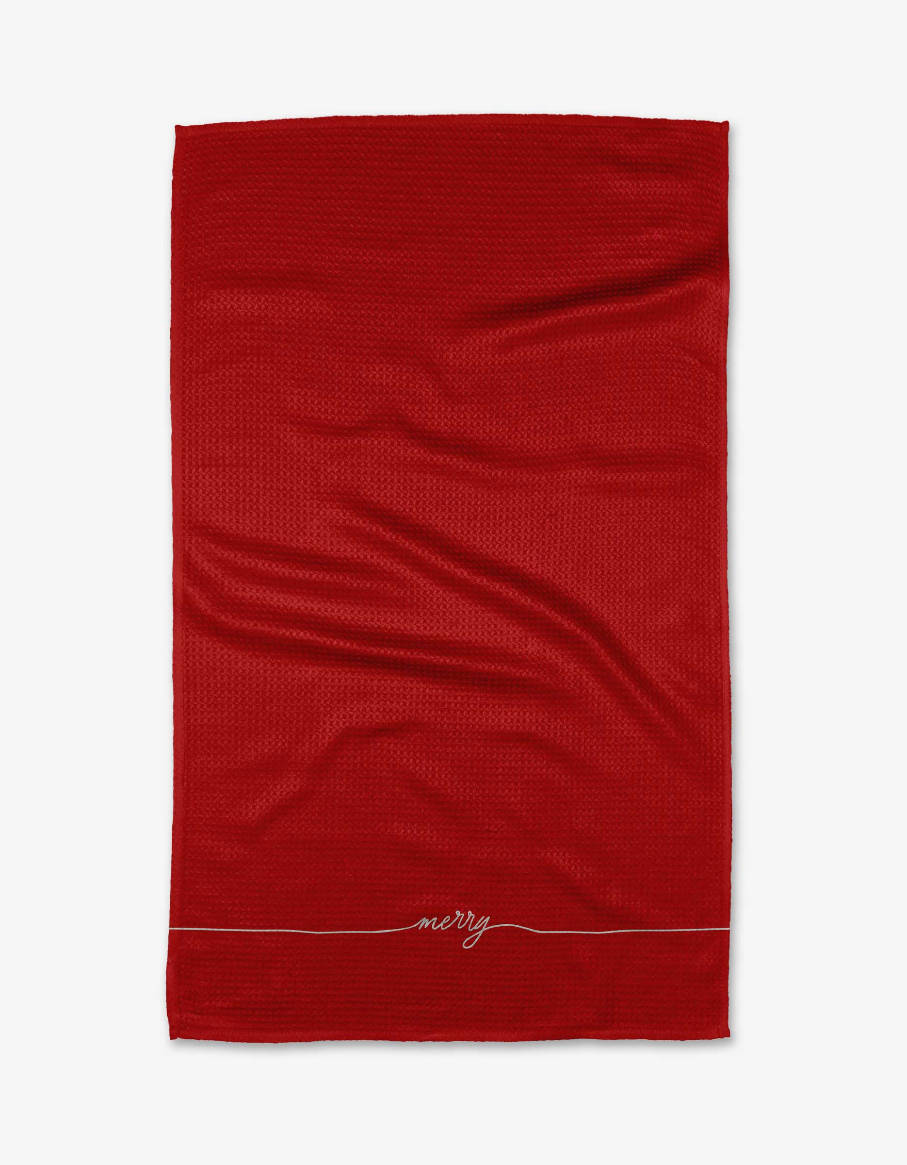 The Rudolph tea towel by Kailee Wright is red and textured, made from quick-drying recycled materials, with “merry” embroidered in small white script near the bottom edge on a white background.
