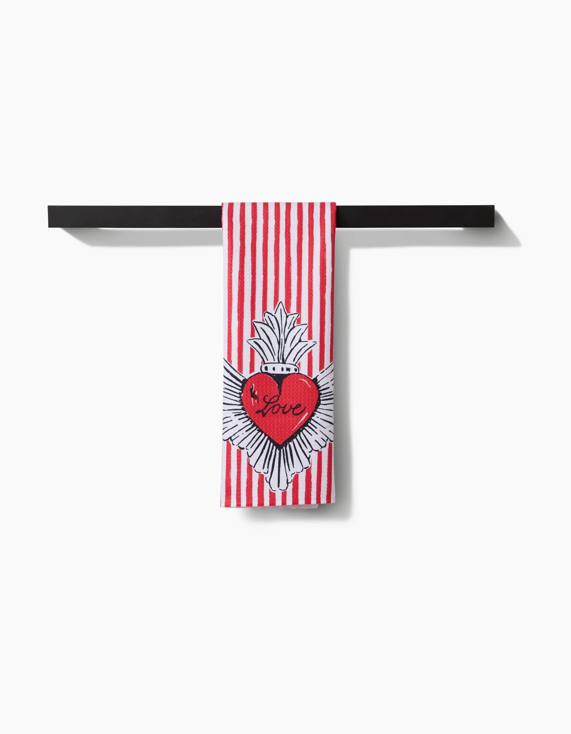 The Hufton Studio Sacred Striped Love Hearts tea towel features red and white stripes, a red heart with Love in cursive, and a black and white decorative motif—ultra-absorbent and perfect for your kitchen.