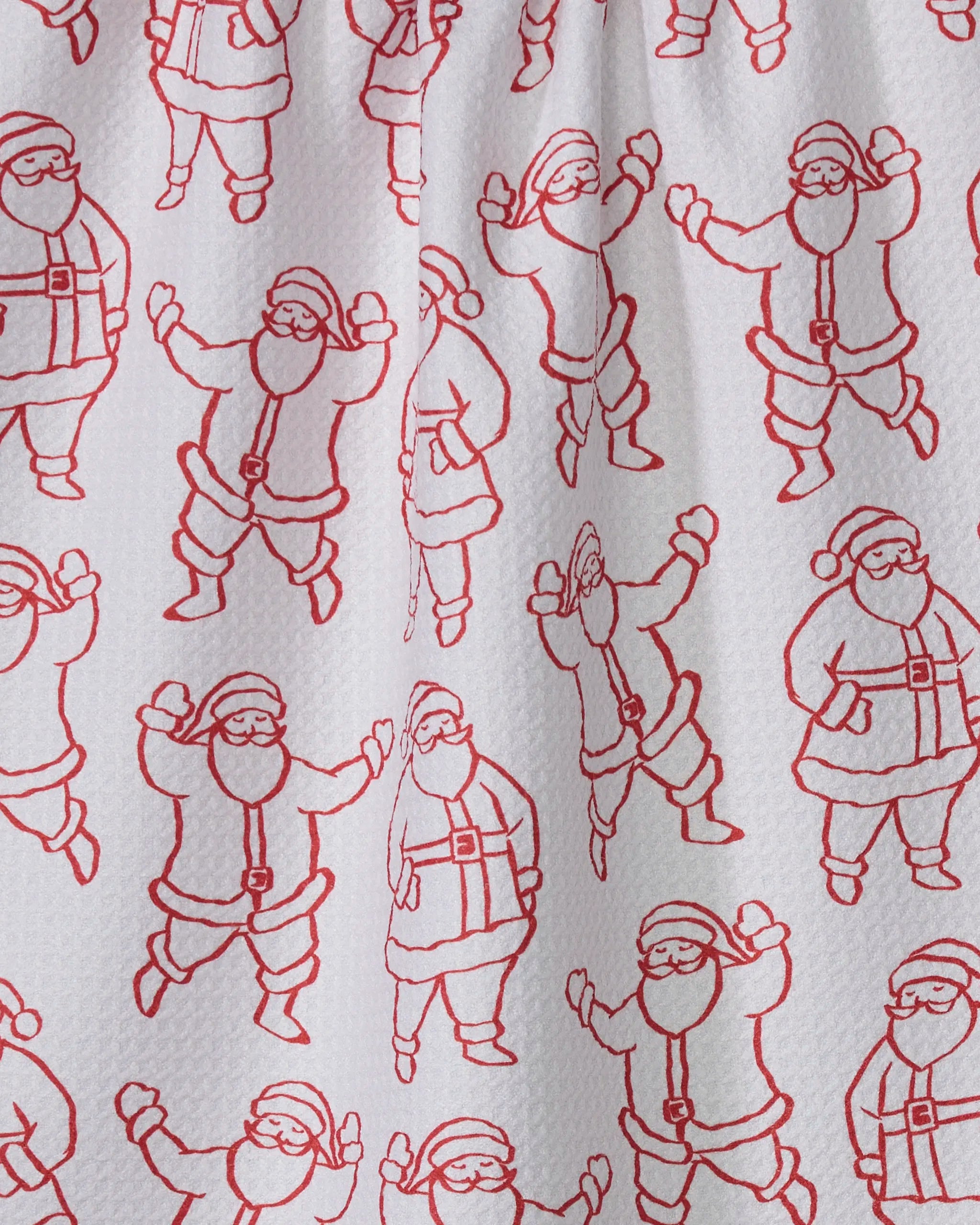 The Santa Groove recycled kitchen towel by Geometry features cheerful red line drawings of Santa Claus in traditional suits and hats, repeated across a textured white background for a festive holiday touch.