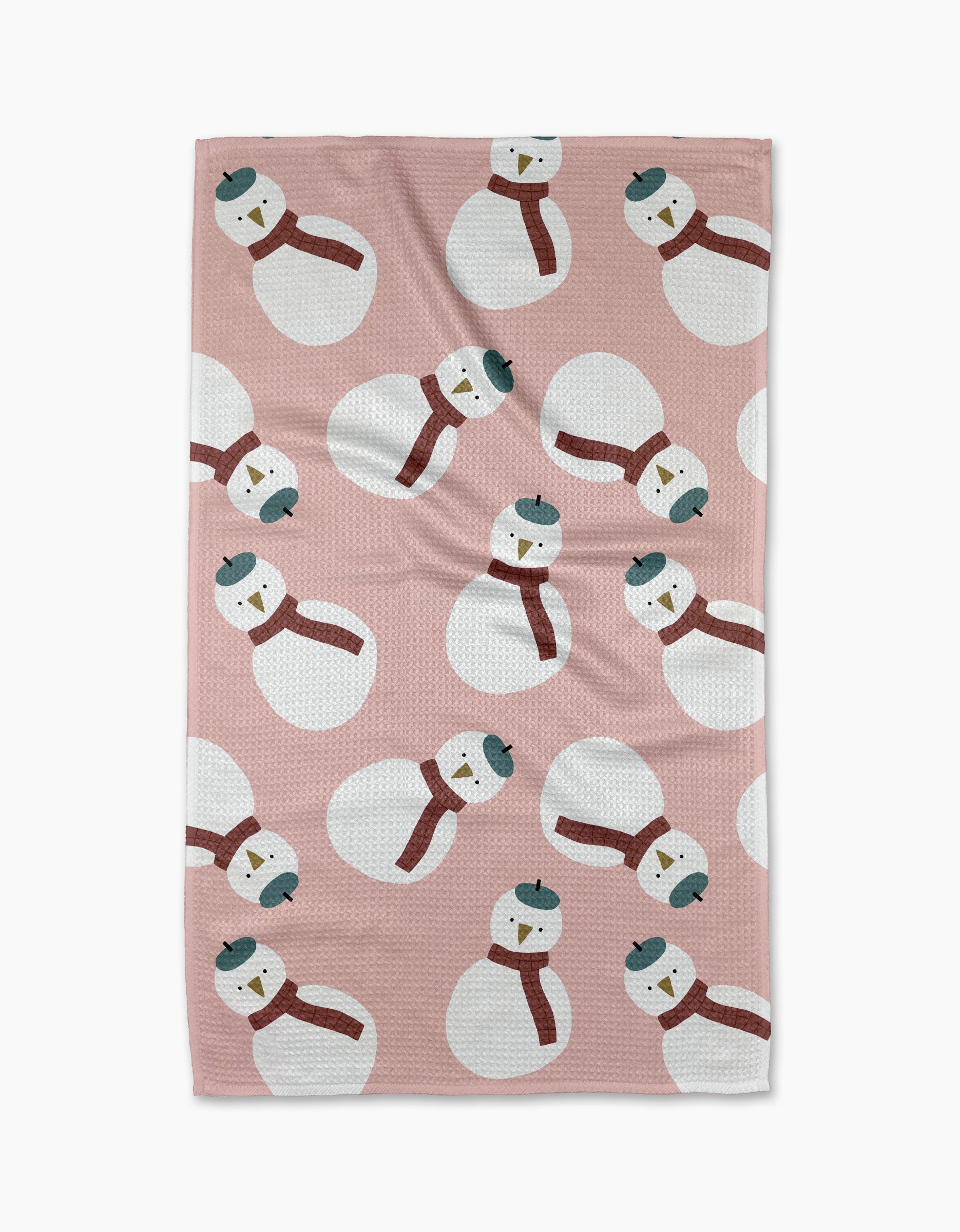 The "Snowman" kitchen tea towel by Jennifer Bouron features white snowmen in red scarves and blue hats on absorbent, recycled fabric—perfect for festive chores.