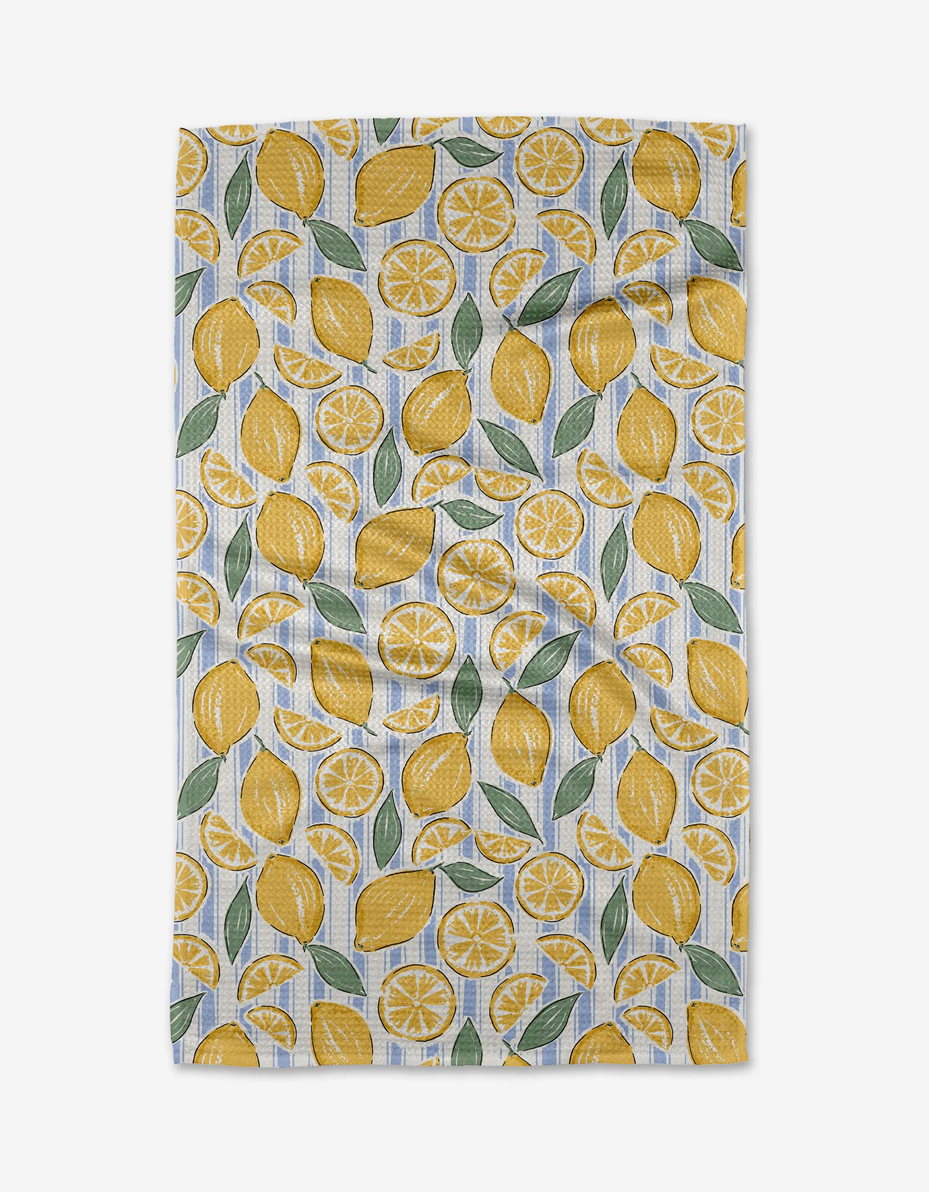 The Sour Lemon Stripes tea towel by Hufton Studio is an ultra-absorbent white kitchen towel featuring a repeating pattern of whole lemons, lemon slices, and green leaves scattered across its surface.
