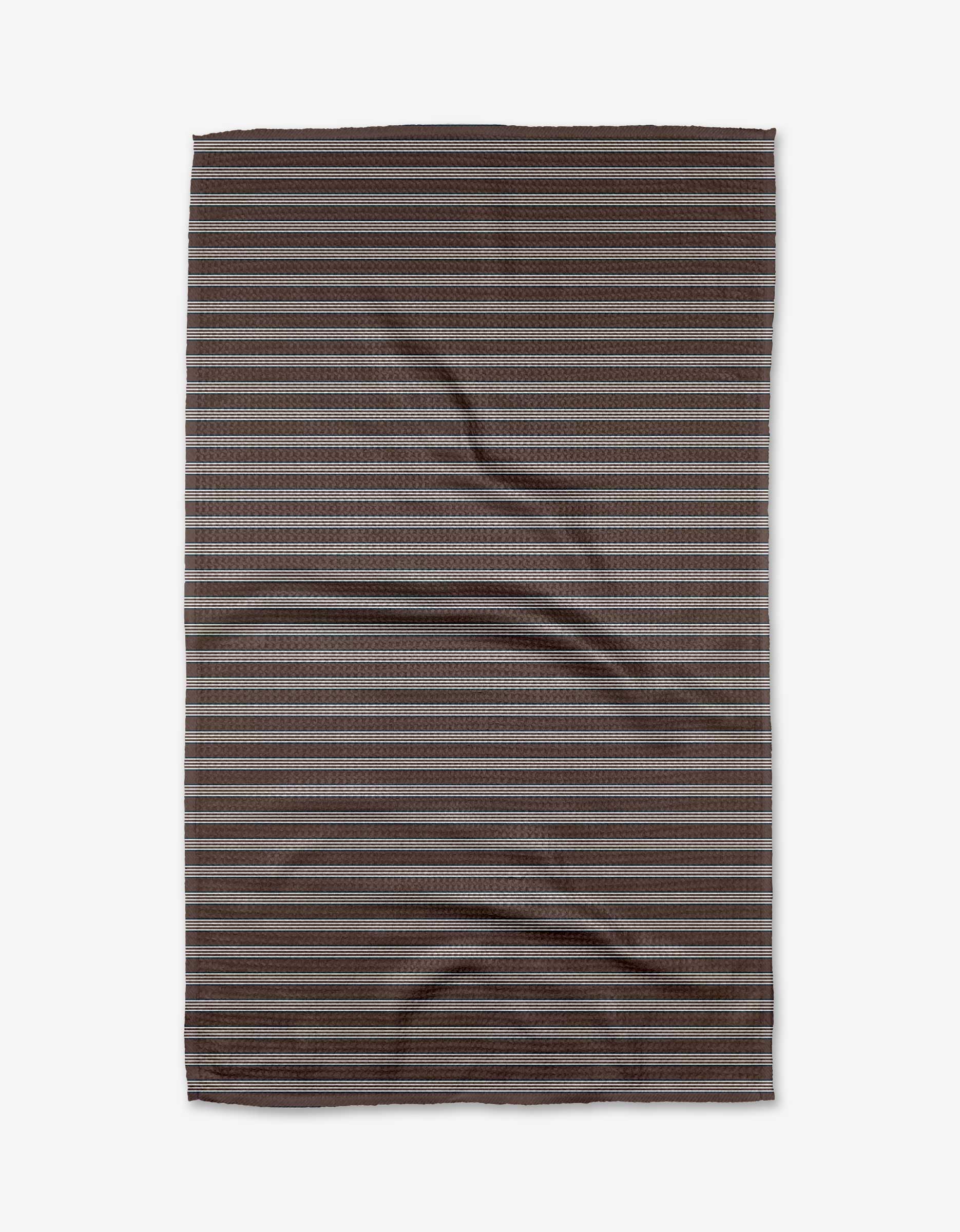 The Straight Across - Chocolate blanket by The Buy Guide features horizontal stripes in brown and gray tones, is made from recycled materials, and is shown flat on a white background with some creases.