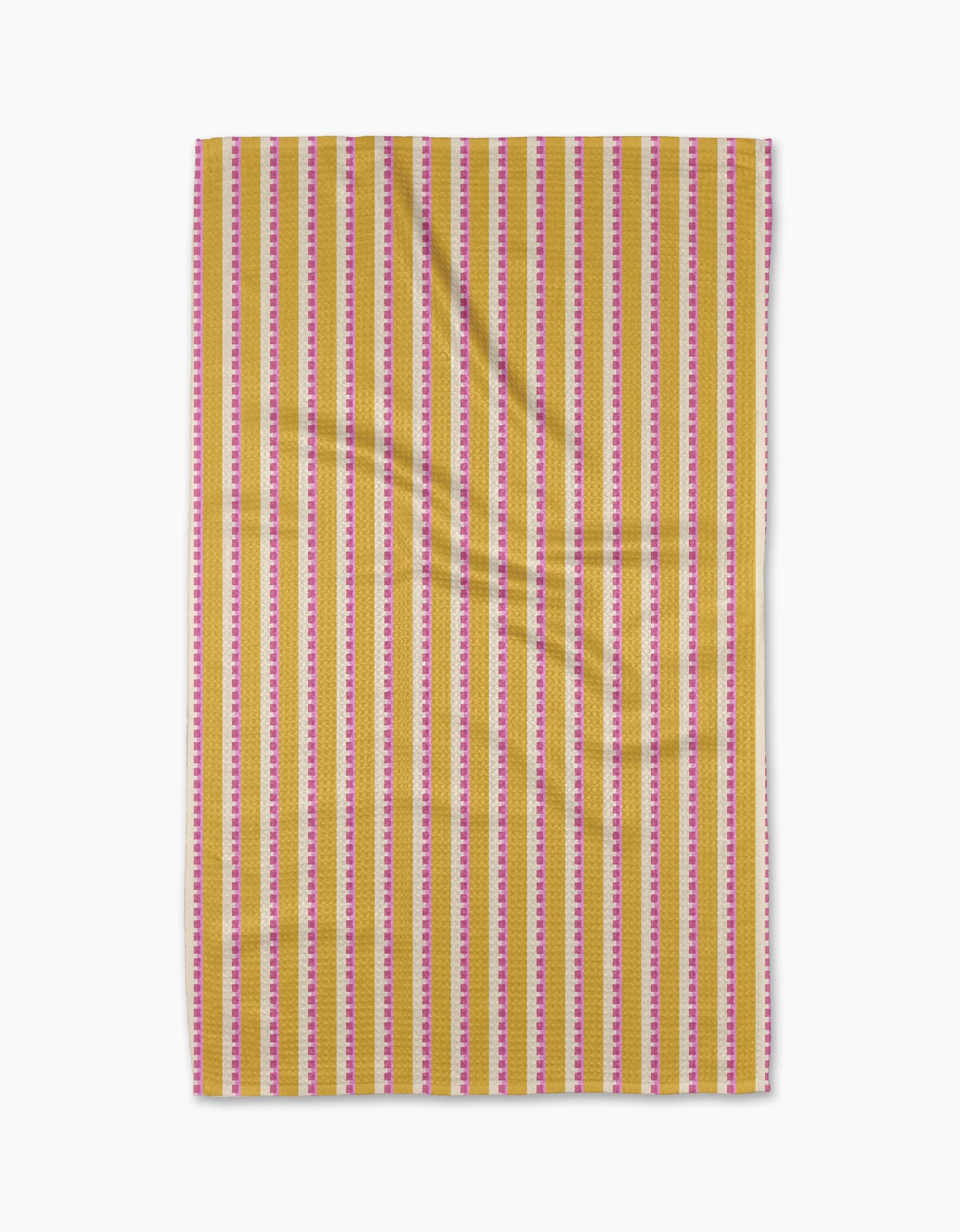 Stripe Mania by Geometry is a rectangular yellow tea towel with vertical red, pink, and white stripes, made from Geoweave™ fabric and shown flat with subtle folds on a white background.