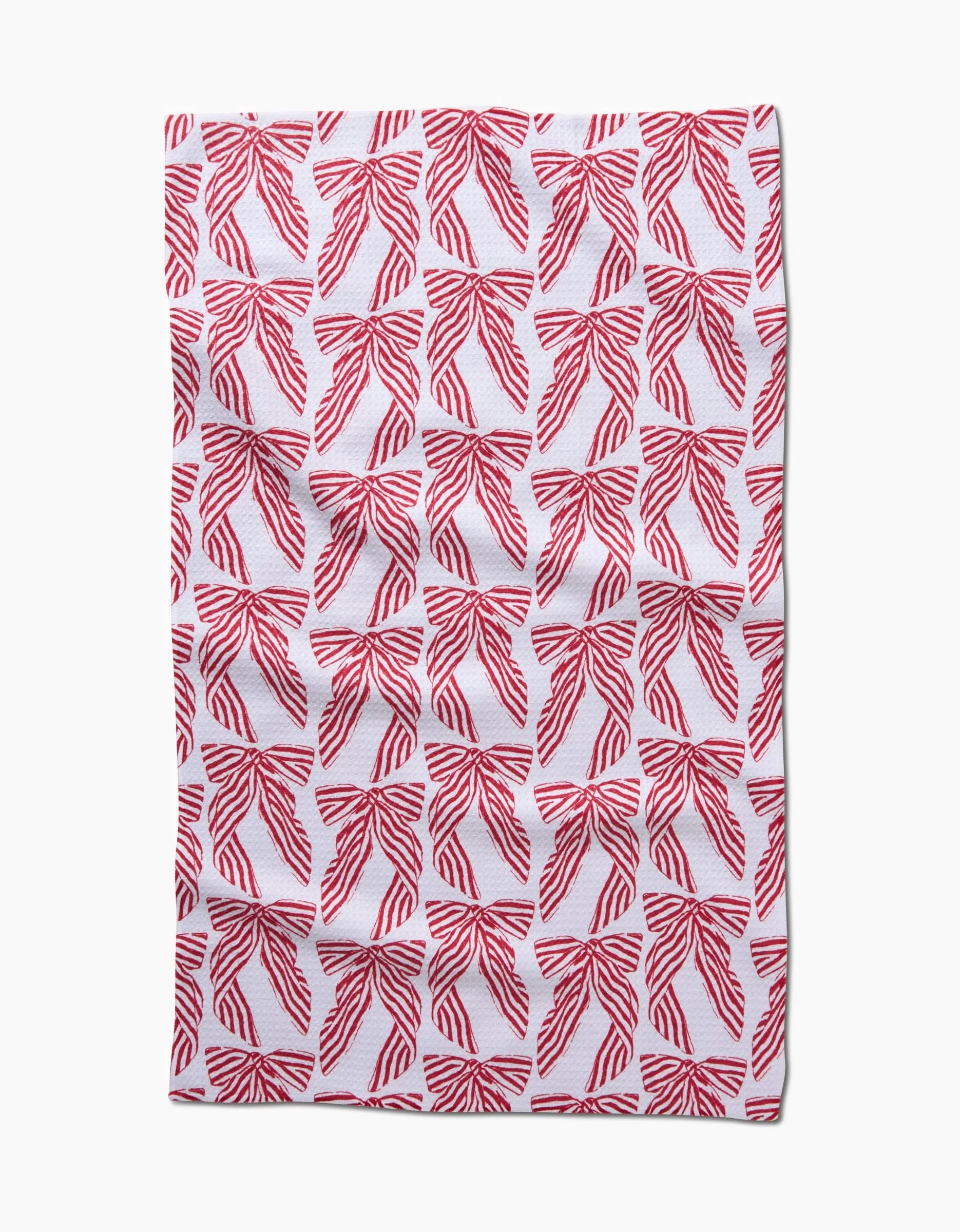 The Hufton Studio Striped Bows tea towel features a repeating red striped bow pattern on white, arranged in neat rows. Made from ultra-absorbent recycled materials, it offers both style and sustainability.