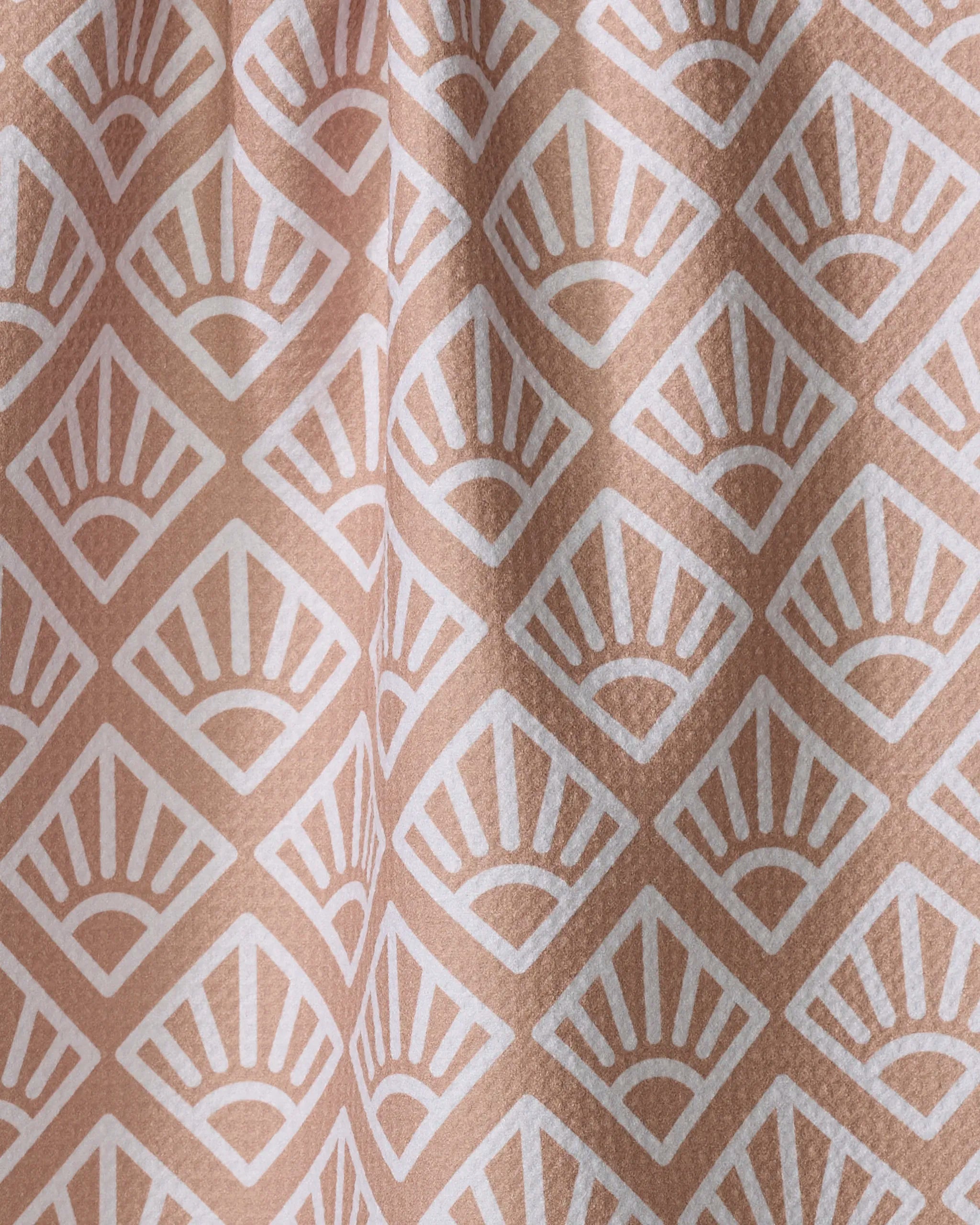 Sunrise Mosaic by Rosa Kichline features beige fabric with a repeating white art deco fan pattern in diamond shapes. Its slightly folded texture makes this absorbent tea towel a charming and functional addition to any kitchen.