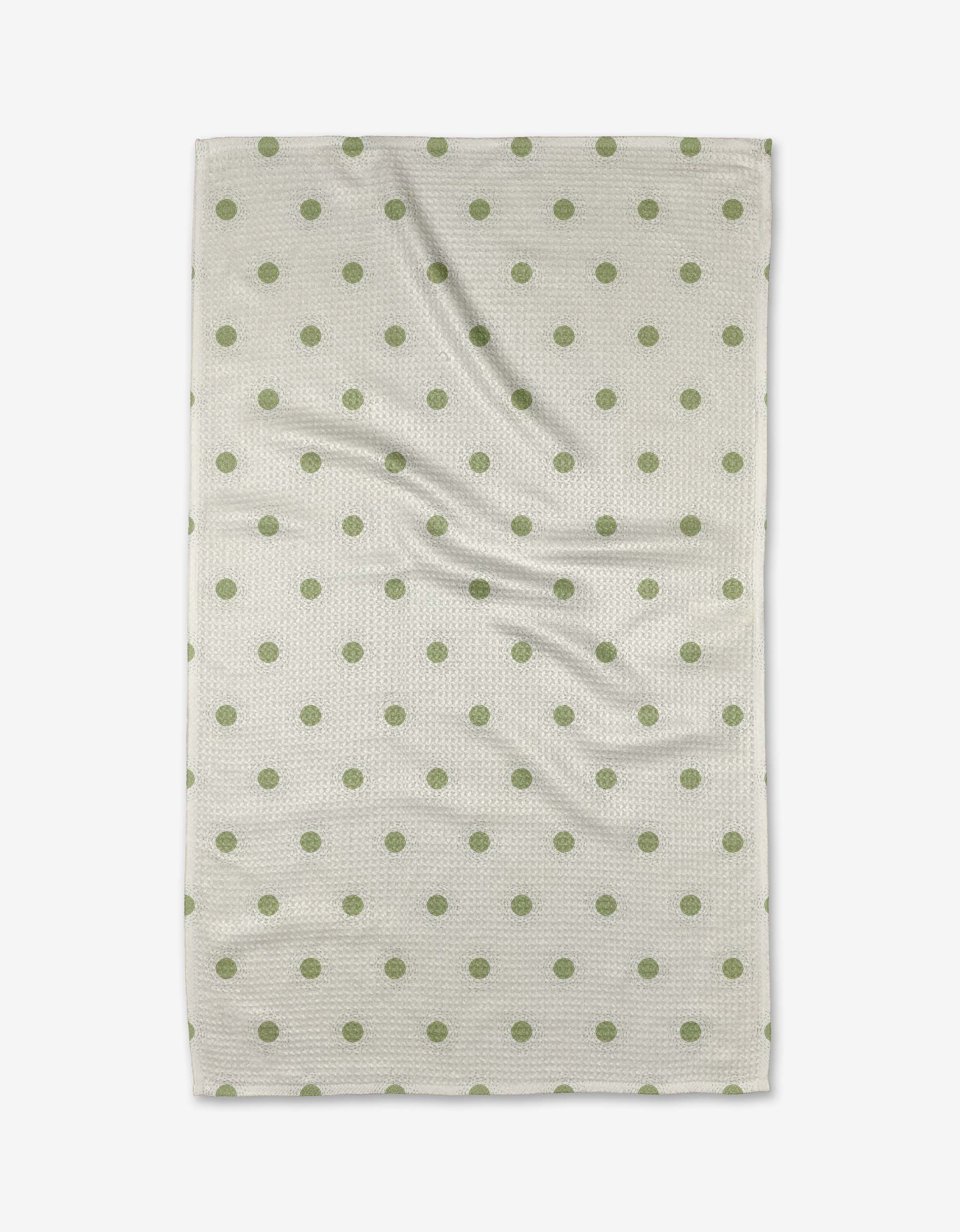 The Danelys Sidron Sunshine Glow is a rectangular white tea towel with evenly spaced green polka dots, shown flat with slight wrinkles.