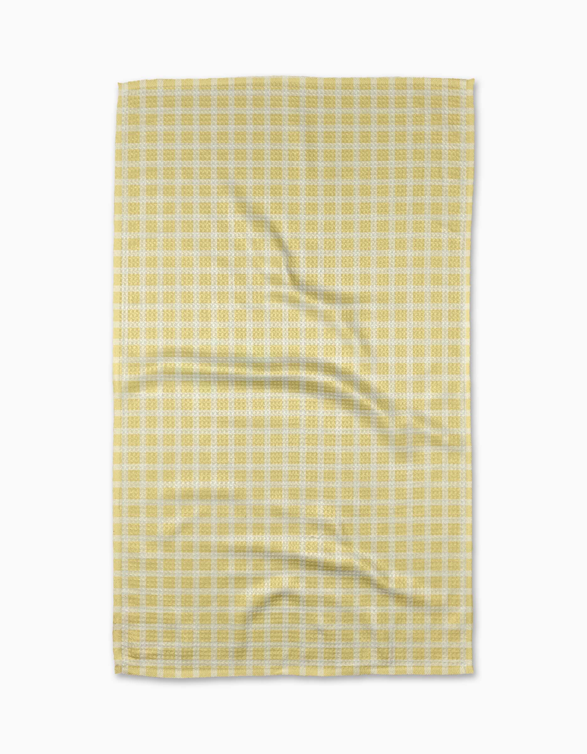 The GEOMETRY Sunspread tea towel features a yellow and white checkered pattern with subtle wrinkles, laid flat on a white background, and is crafted from recycled materials.