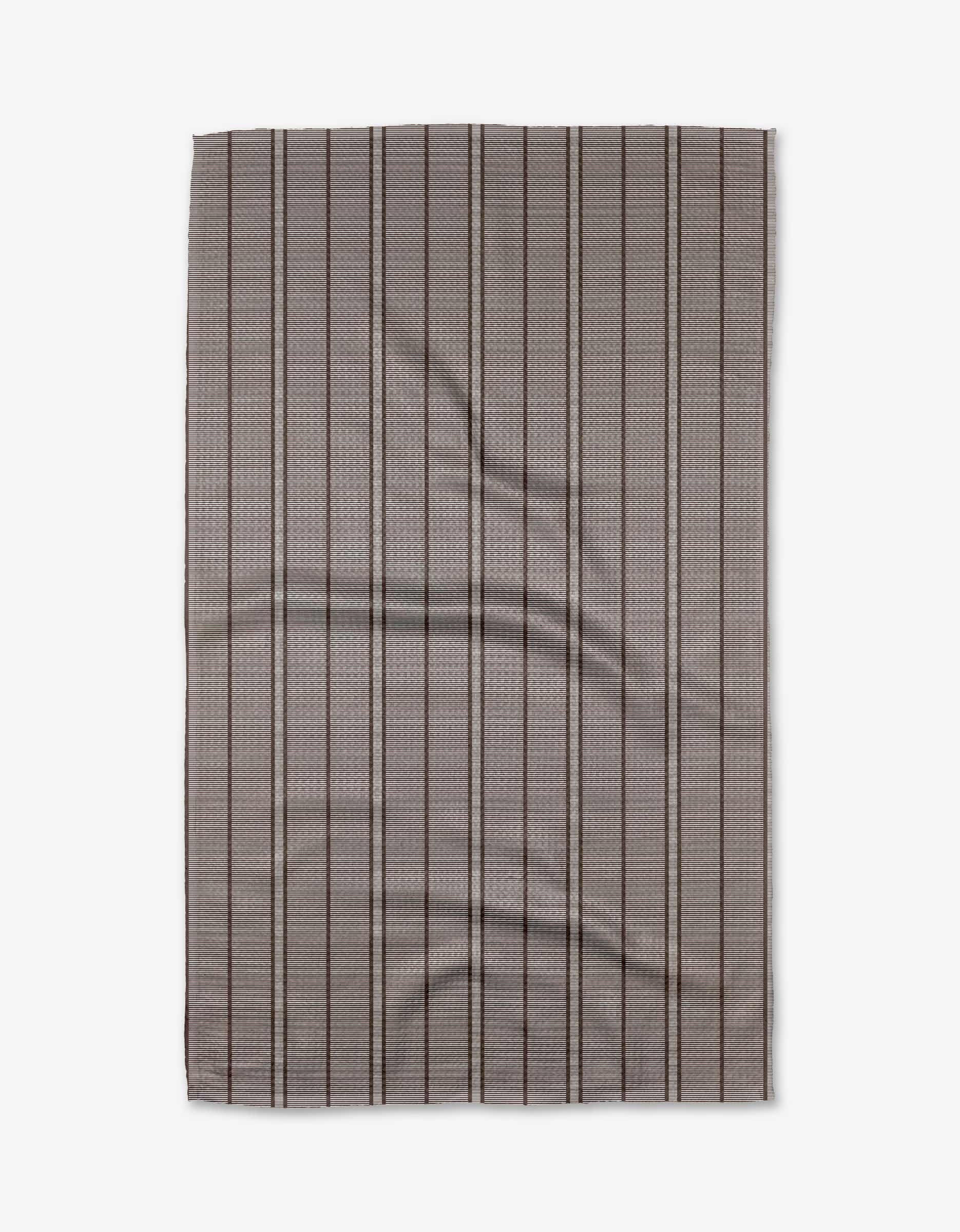 The Buy Guides Super Stripe - Chocolate is a rectangular, flat Geoweave fabric in gray with a subtle checkered pattern and thin, evenly spaced vertical black stripes, shown slightly wrinkled on a white background.