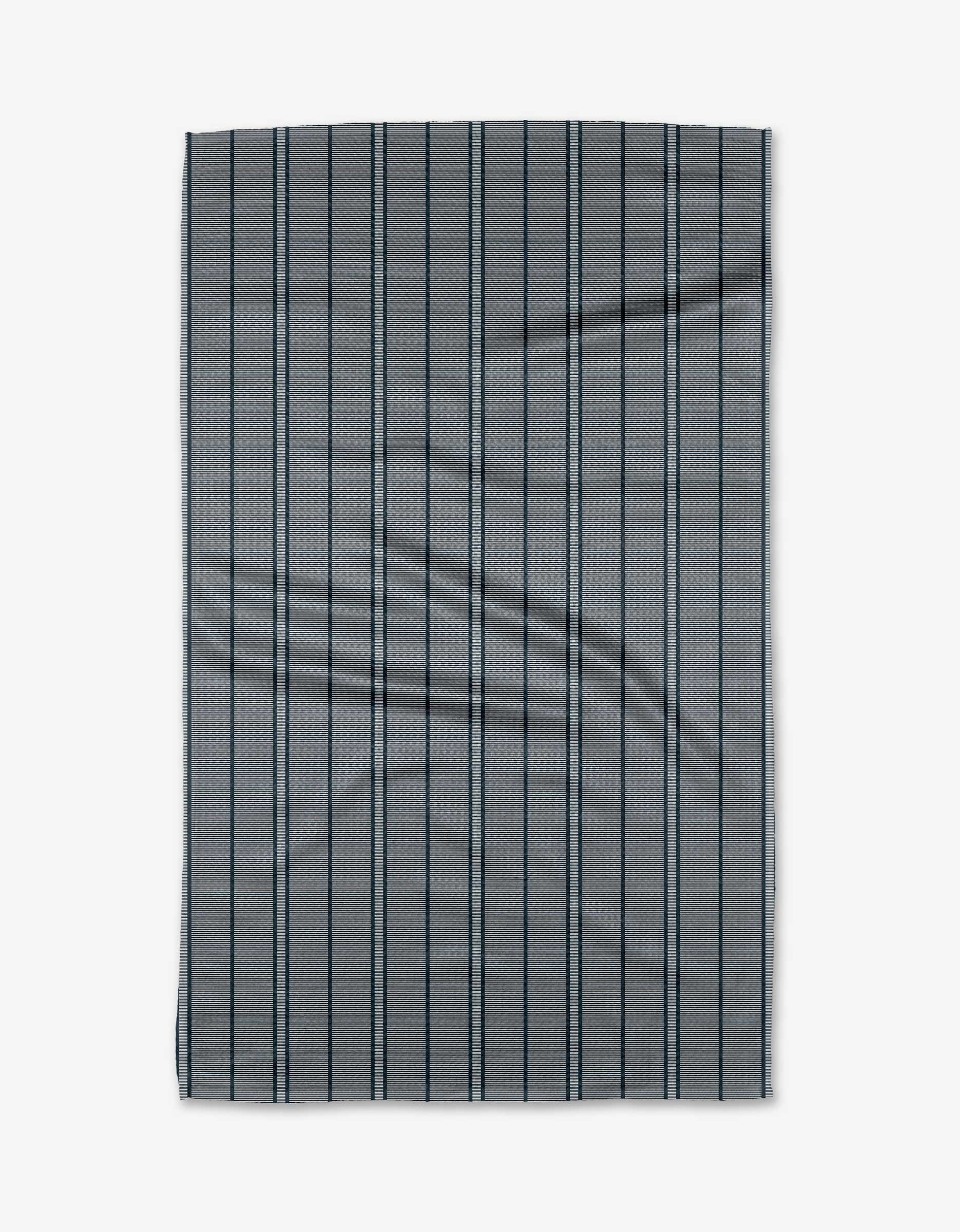 A rectangular navy Super Stripe tea towel by The Buy Guide features bold dark stripes. Made from Geoweave fabric, it has slight wrinkles and is laid flat on a white background.