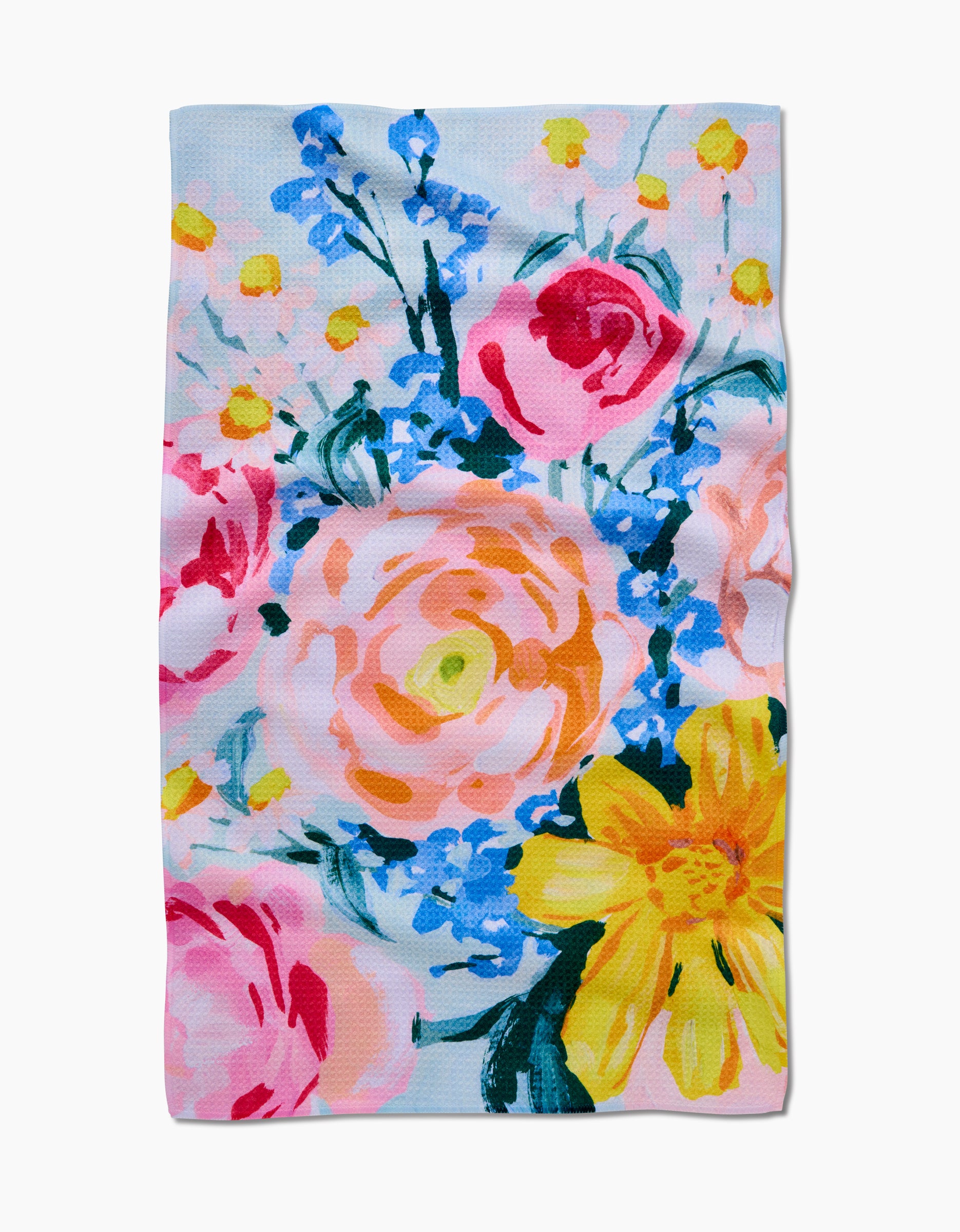 The Suzzy tea towel by Ania Zwara Art features a vibrant floral pattern with pink roses, yellow daisy-like blooms, and blue accents on a light background, crafted from soft Geoweave fabric.