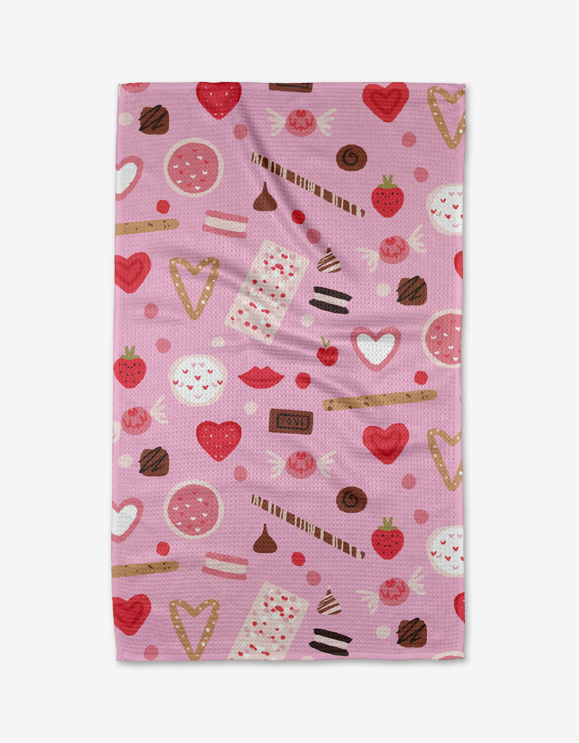 The Sweet Lovin kitchen towel by Janna Sue Design is an eco-friendly pink towel decorated with assorted sweets—strawberries, chocolates, cookies, candy hearts, and chocolate sticks in red, pink, and brown.