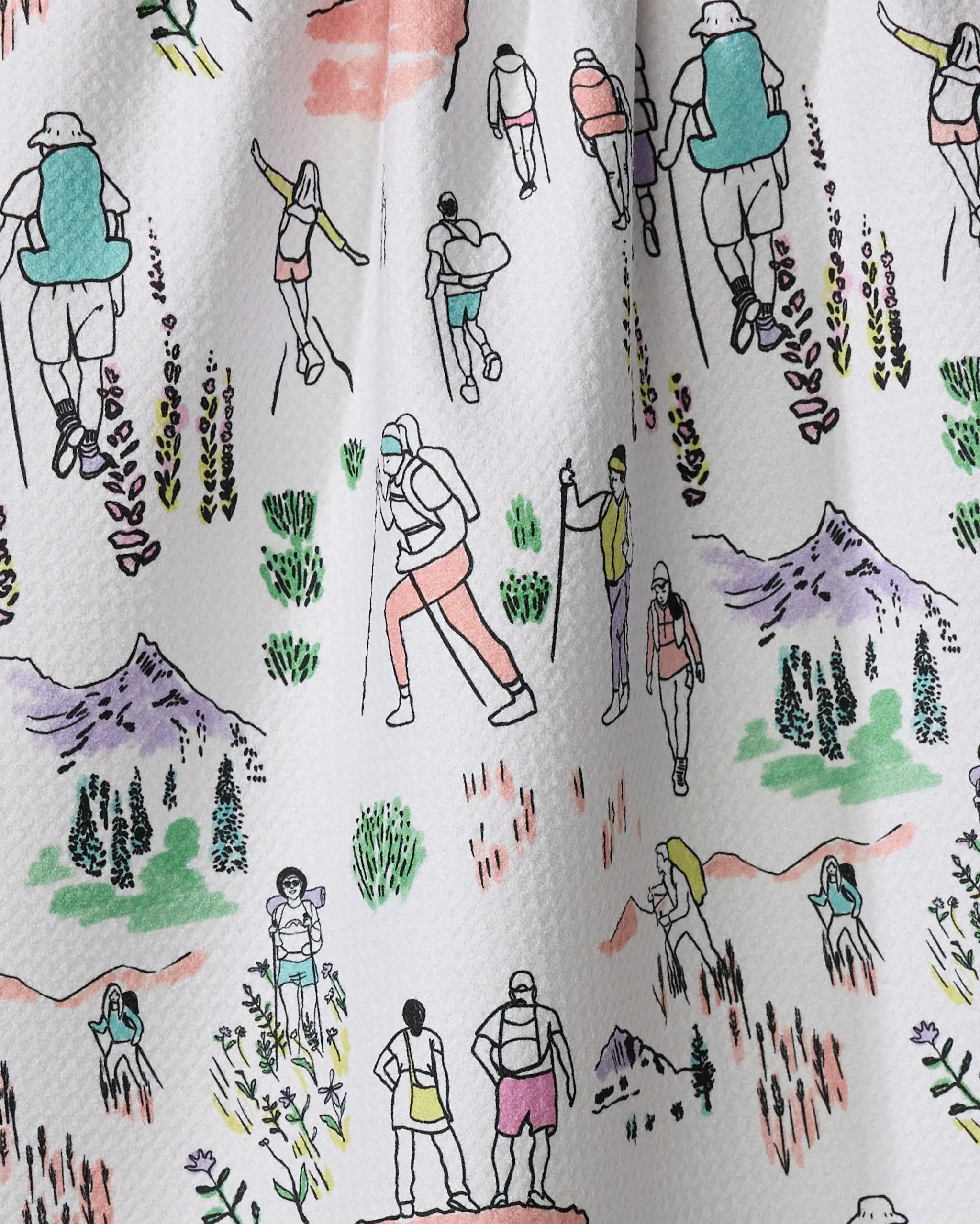 The Take A Hike kitchen towel by Elisabeth Wing features pastel hiker, mountain, plant, and wildflower illustrations on white. Made from recycled materials.