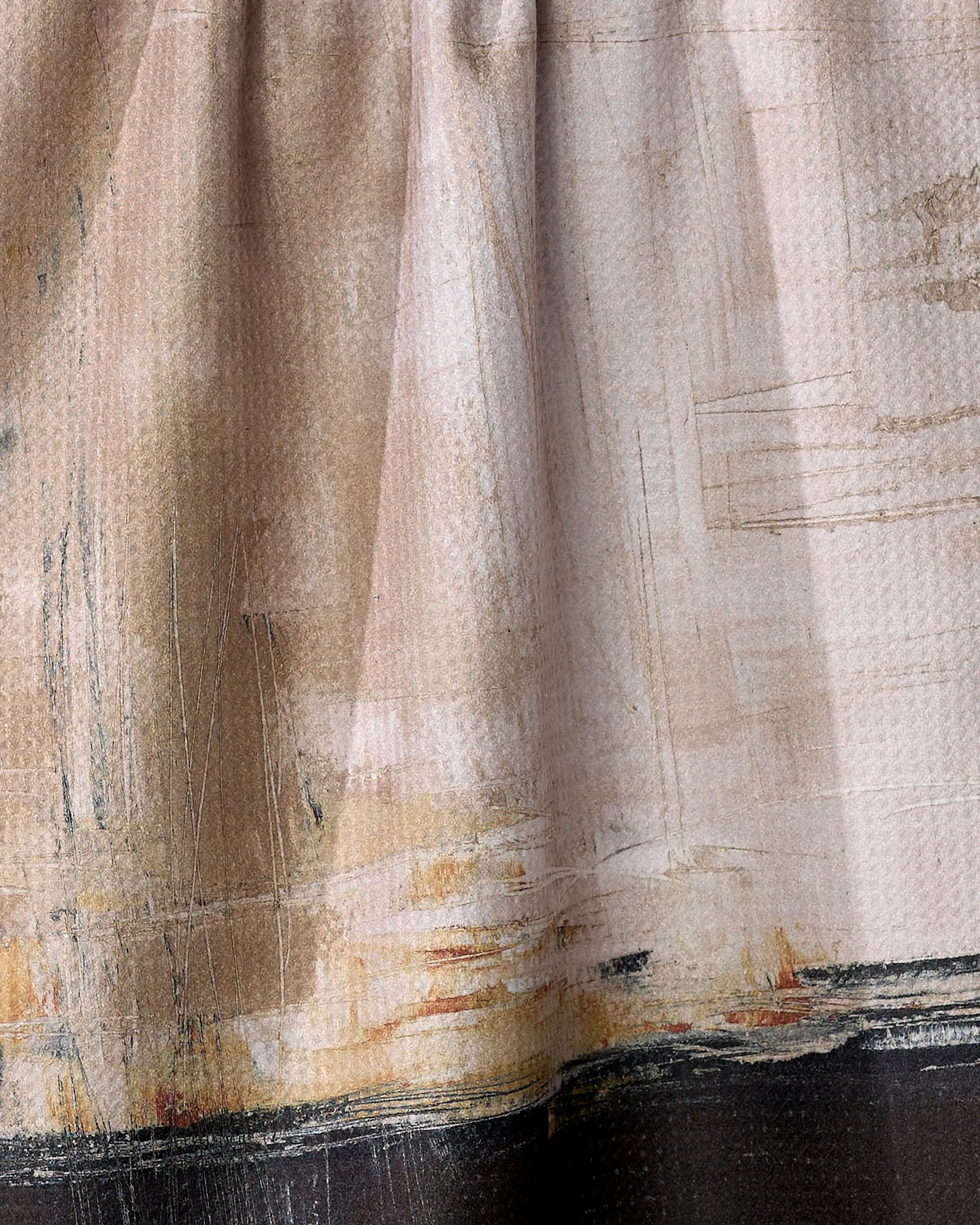 Close-up of the Uncharted Territory tea towel by Jennifer Bouron, featuring ultra-absorbent recycled fabric with a textured abstract pattern in beige, cream, and brown brush strokes plus dark accents along the bottom edge.