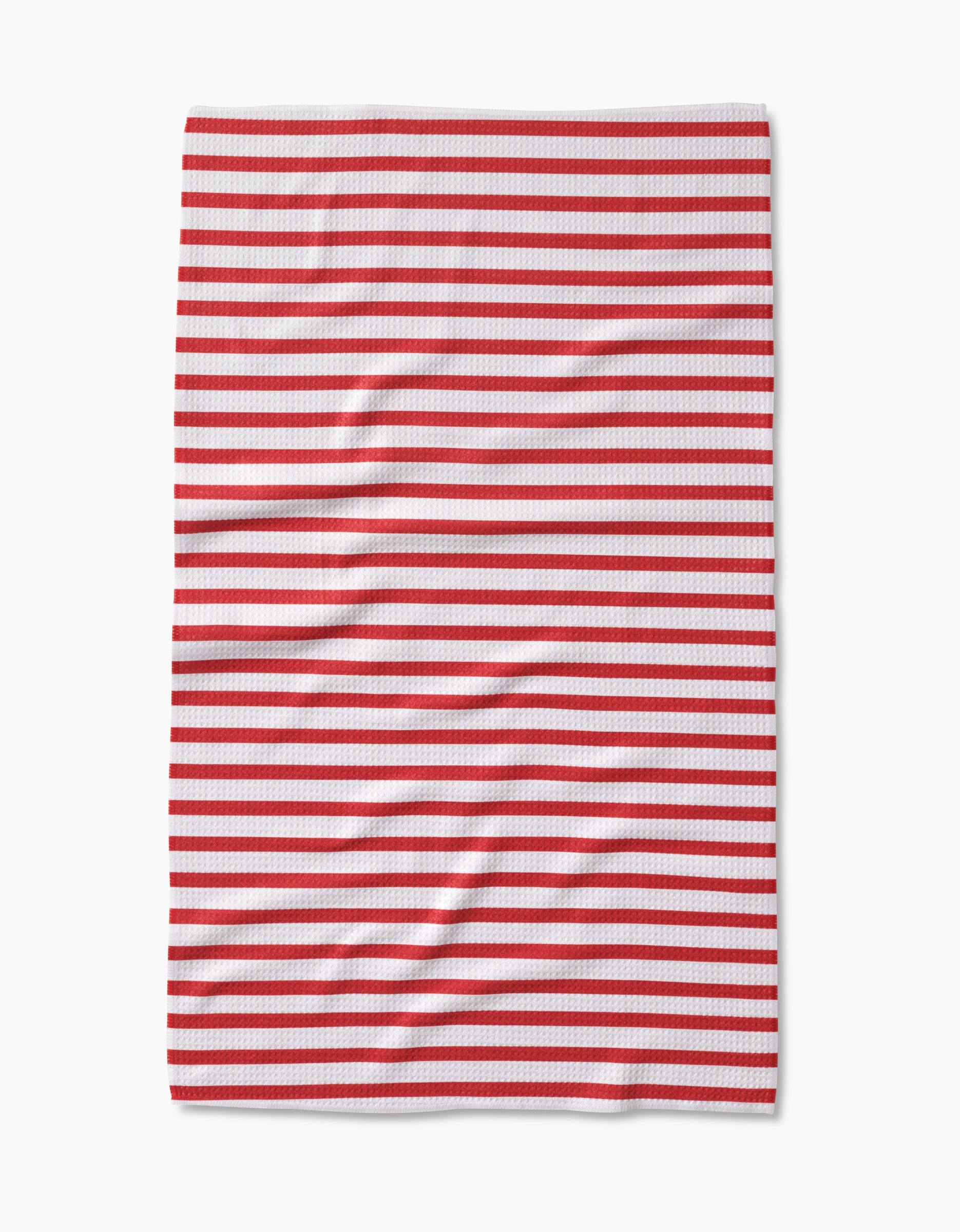 The Mindfulnice USA Stripes tea towel features evenly spaced horizontal red and white stripes on Geoweave fabric. Laid flat with gentle wrinkles, the stripes stand out against the crisp white background.
