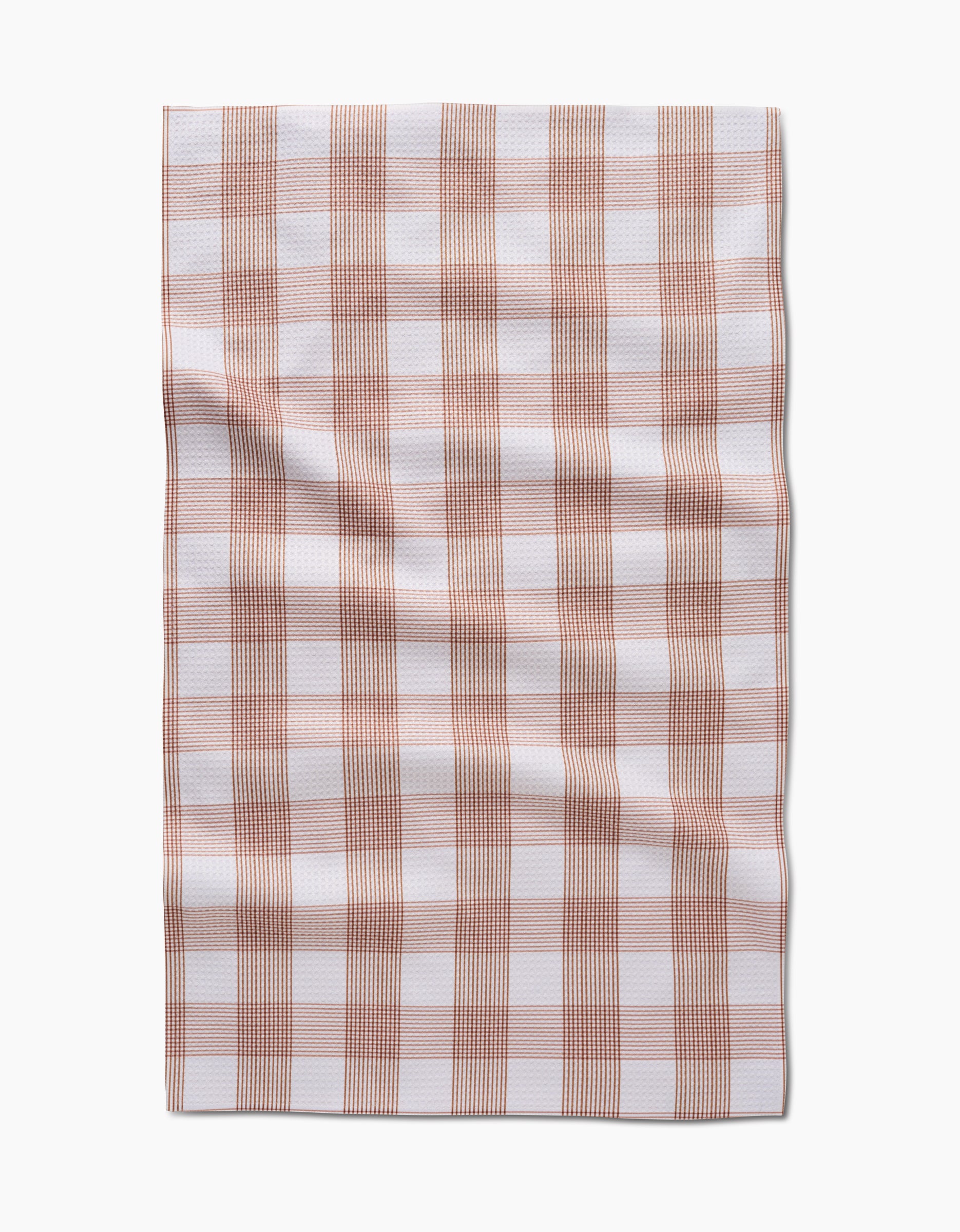 The Hufton Studio Vintage Gingham Natural tea towel features a soft Geoweave fabric and a white base with light brown and beige checkered stripes, shown flat with natural wrinkle folds.