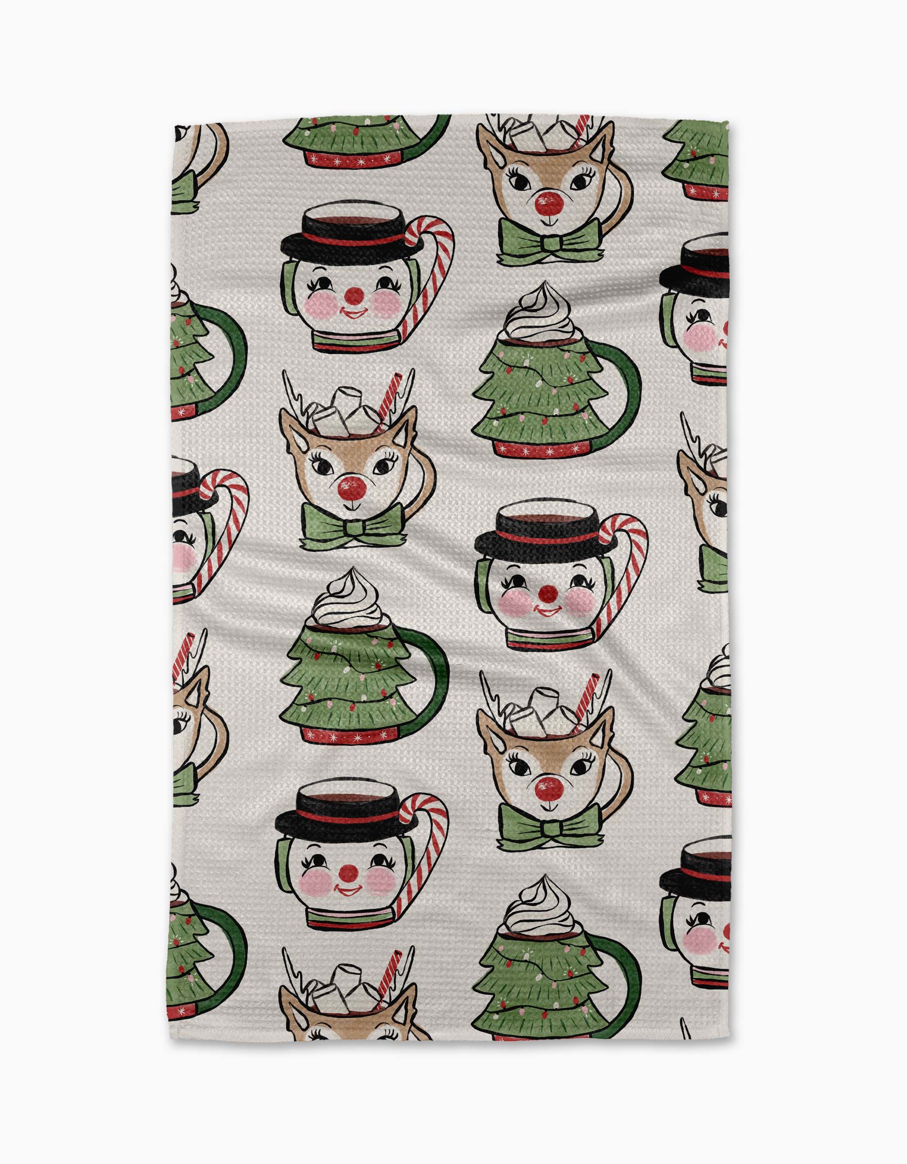 Add cheer to your kitchen with the Louise Pretzel Vintage Mugs towel, featuring festive reindeer and Christmas tree mugs with whipped cream, plus face mugs with candy cane handles, all on a bright white background.
