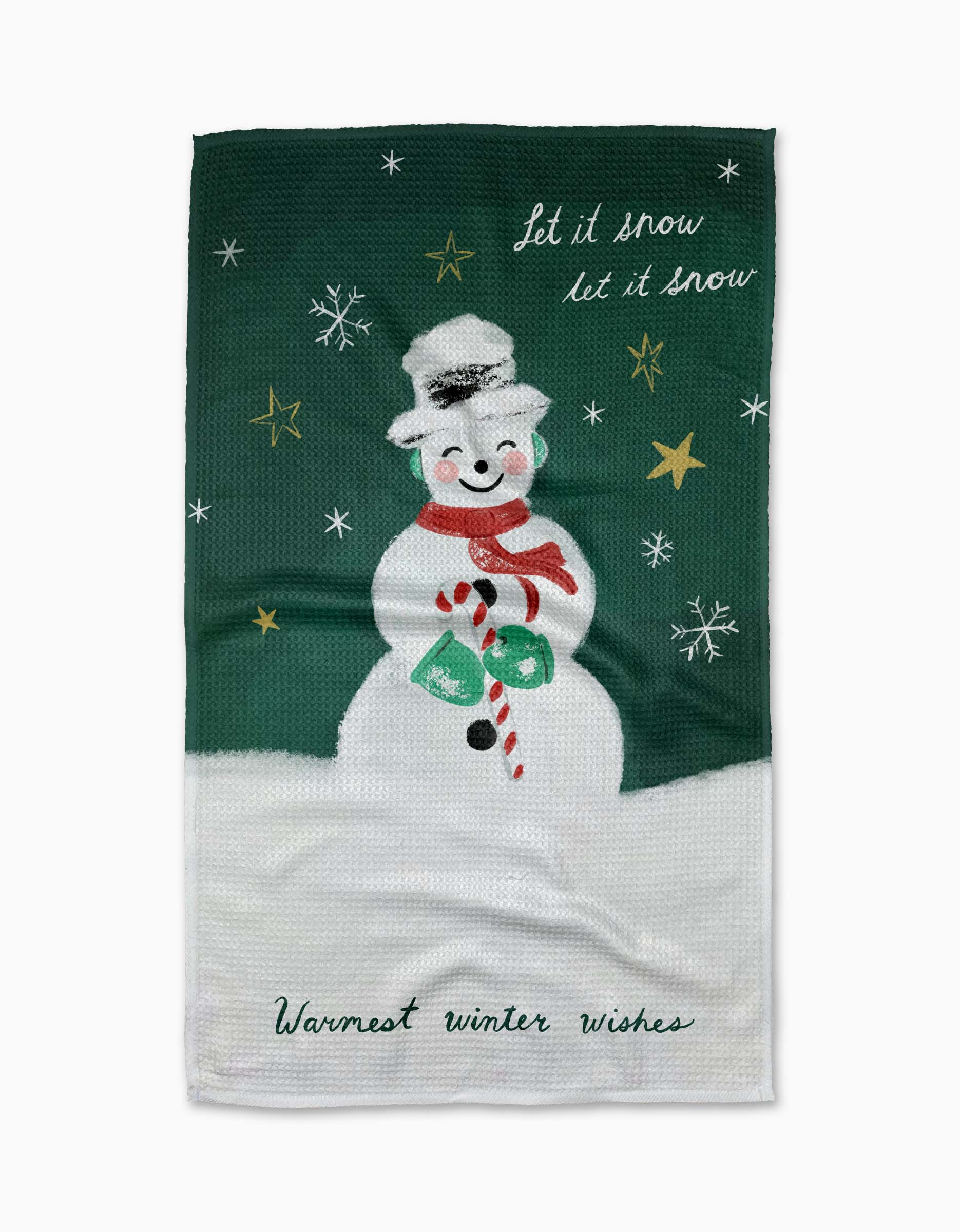 The Louise Pretzel "Vintage Snowman" towel features a smiling snowman in hat, scarf, and mittens holding a candy cane amid snowflakes and stars, with the phrases “Let it snow, let it snow” and “Warmest winter wishes.”.
