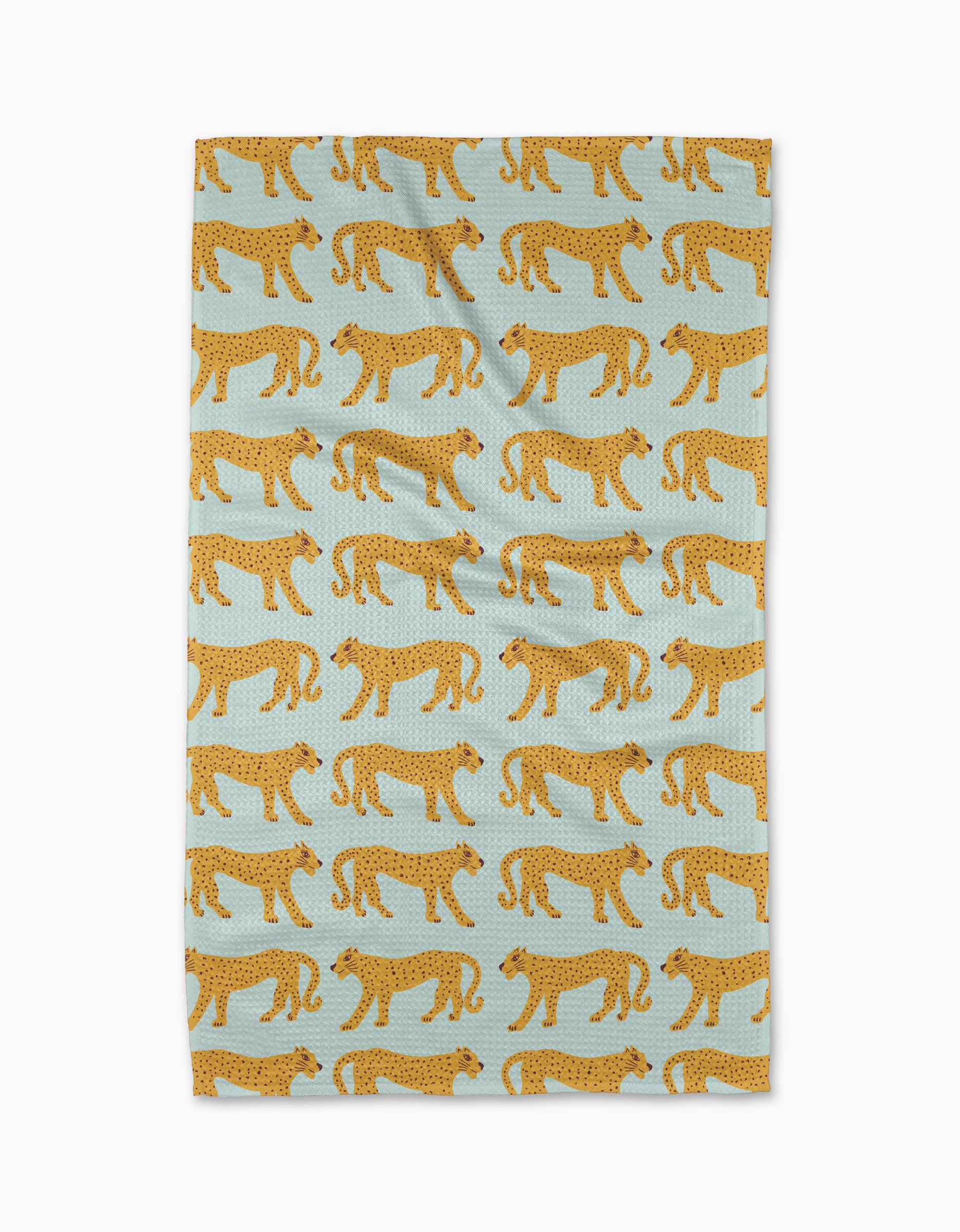 The Walking Cheetah tea towel by Jasmine Blooms Designs features a light blue background with a repeating pattern of stylized yellow cheetahs with black spots walking in alternating directions.