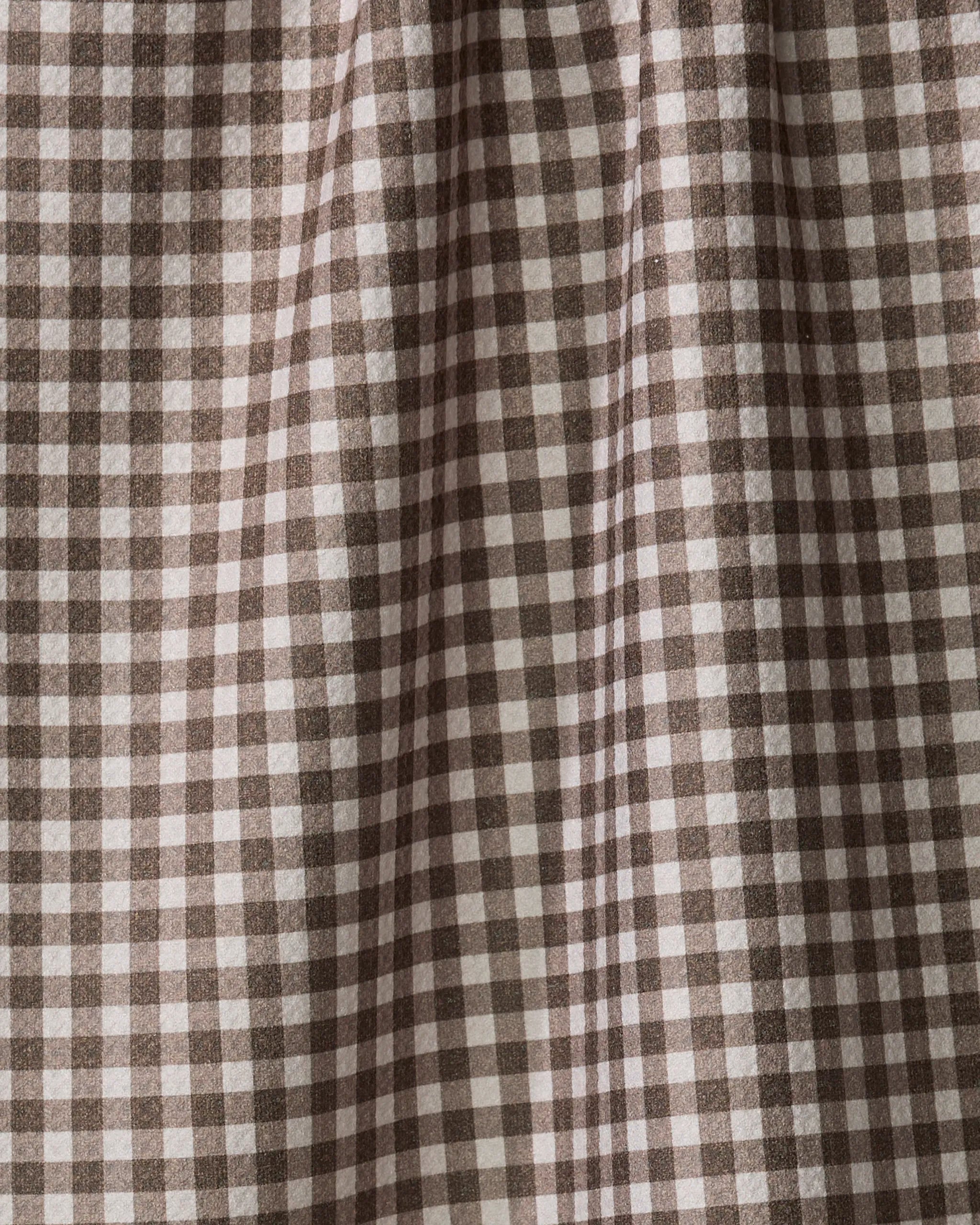 Close-up of Jenny Keller's Whidbey Check, a brown and white gingham fabric with a small checkered pattern, gentle folds, and soft texture—perfect for an ultra-absorbent tea towel.