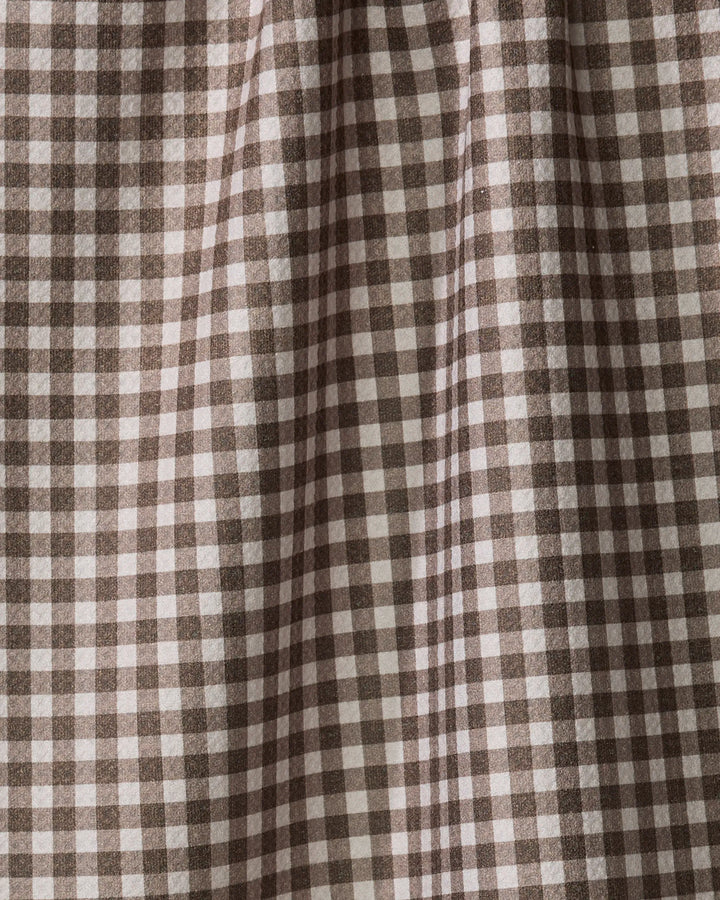 Close-up of Jenny Keller's Whidbey Check, a brown and white gingham fabric with a small checkered pattern, gentle folds, and soft texture—perfect for an ultra-absorbent tea towel.