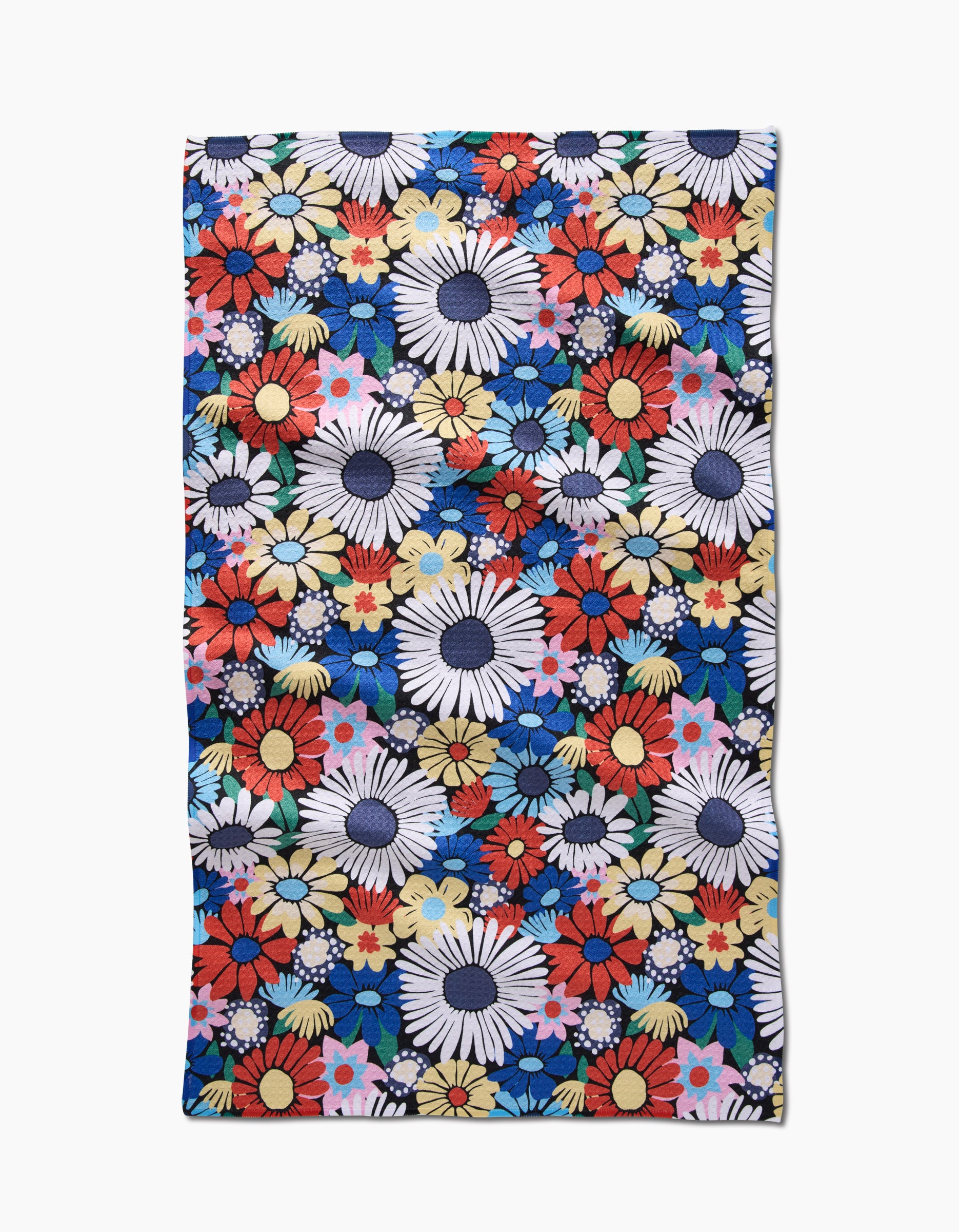 The Wildflowers Bouquet Tea Towel by Claire Iglesias features a dense floral pattern in white, red, yellow, pink, and blue on dark blue Geoweave™ fabric for superior absorbency.