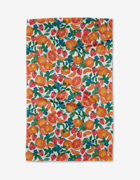 The Zesty Life tea towel by Aubrey Fairchild showcases a lively print of oranges, strawberries, and green leaves on white, expertly made from recycled materials.