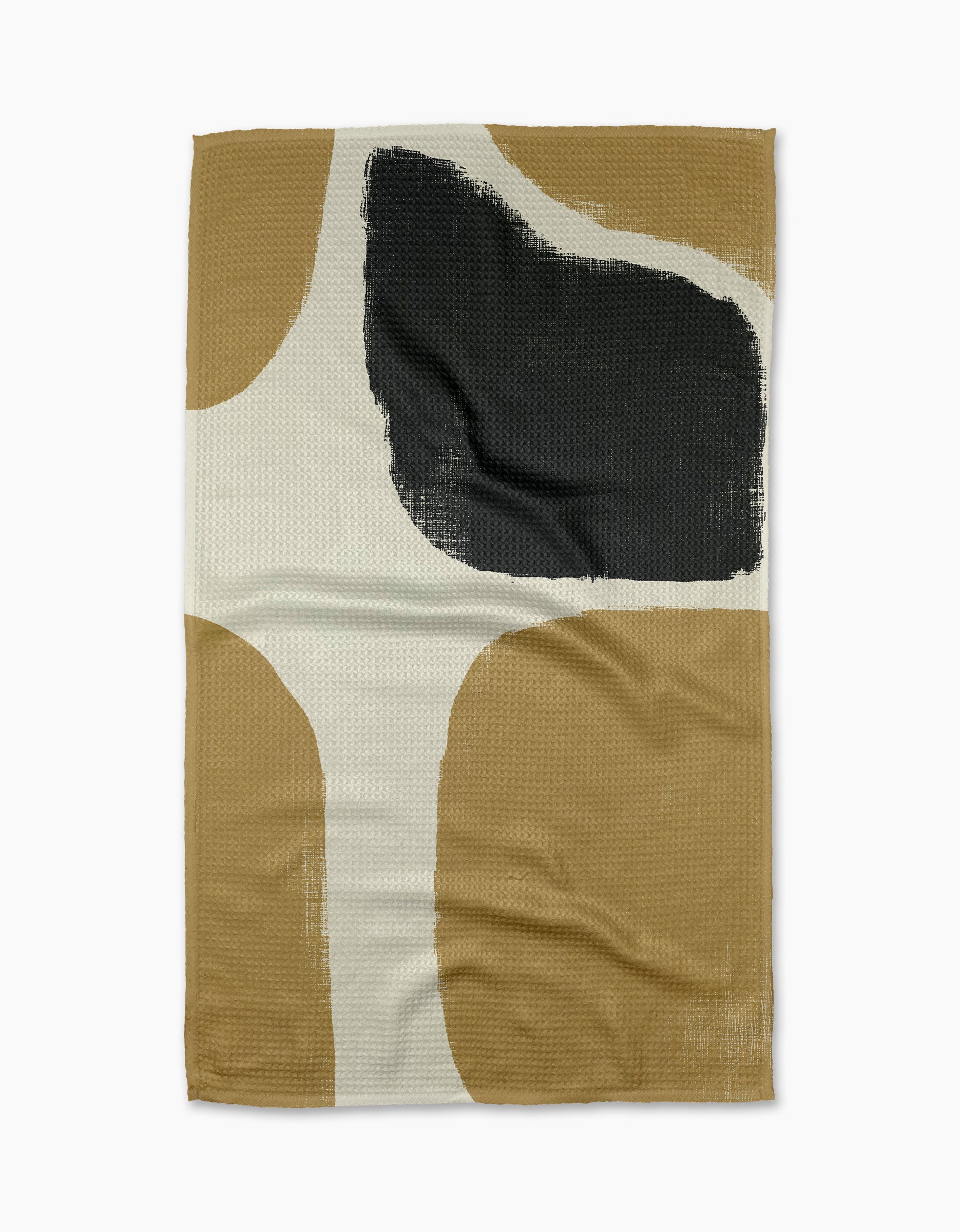 Geometrys Bend tea towel is a rectangular, ultra-absorbent piece featuring an abstract design with beige, tan, white, and a bold black brushstroke. Curved color blocks add a modern flair.