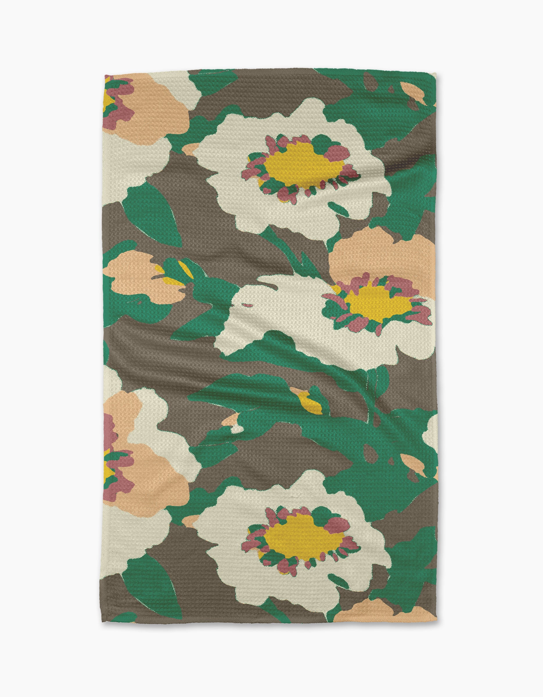 The Darla tea towel by Geometry features bold abstract florals and leaves in green, white, beige, yellow, and pink on a brown background. Made from quick-drying recycled materials for convenience.