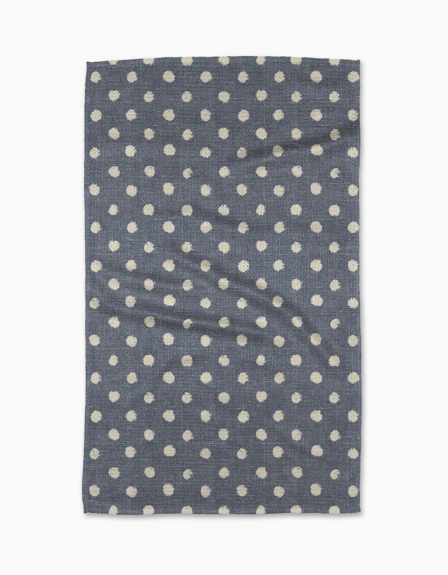 The Geometry Freckle Jean is a rectangular blue tea towel with evenly spaced white polka dots. Quick-drying and practical, it adds charm to any kitchen.